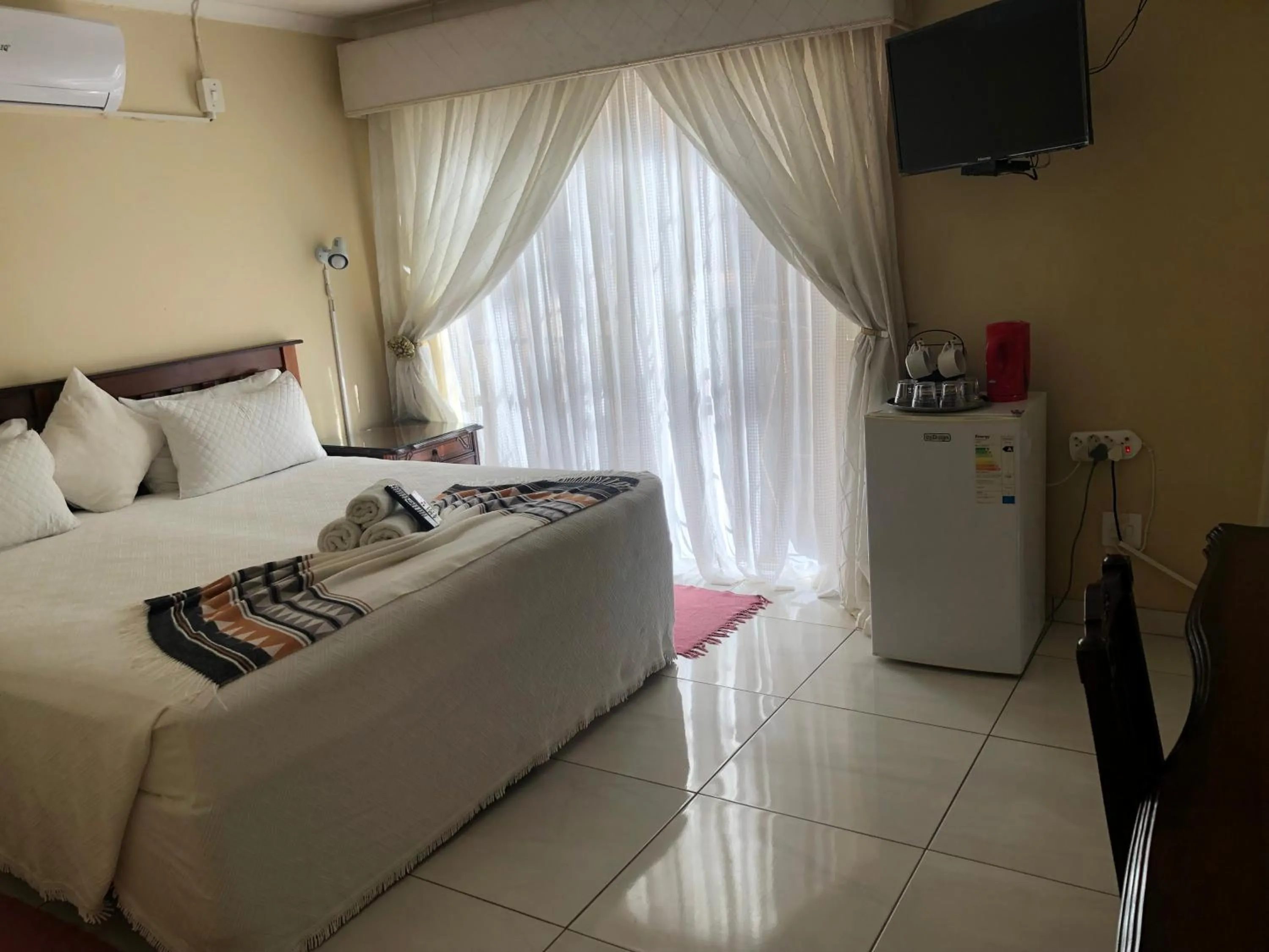 Bed in Kamogelo Guest House