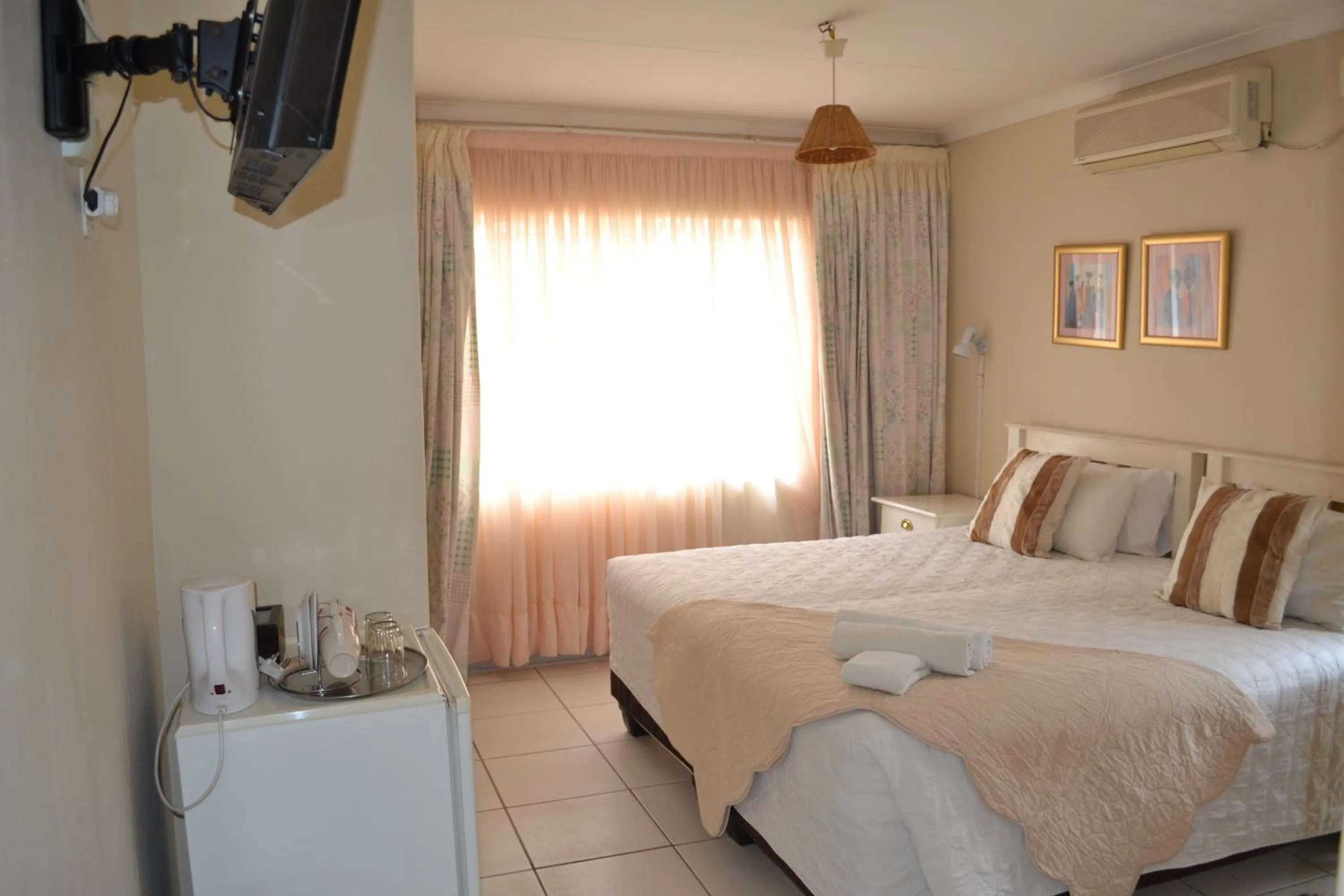 Bed in Kamogelo Guest House