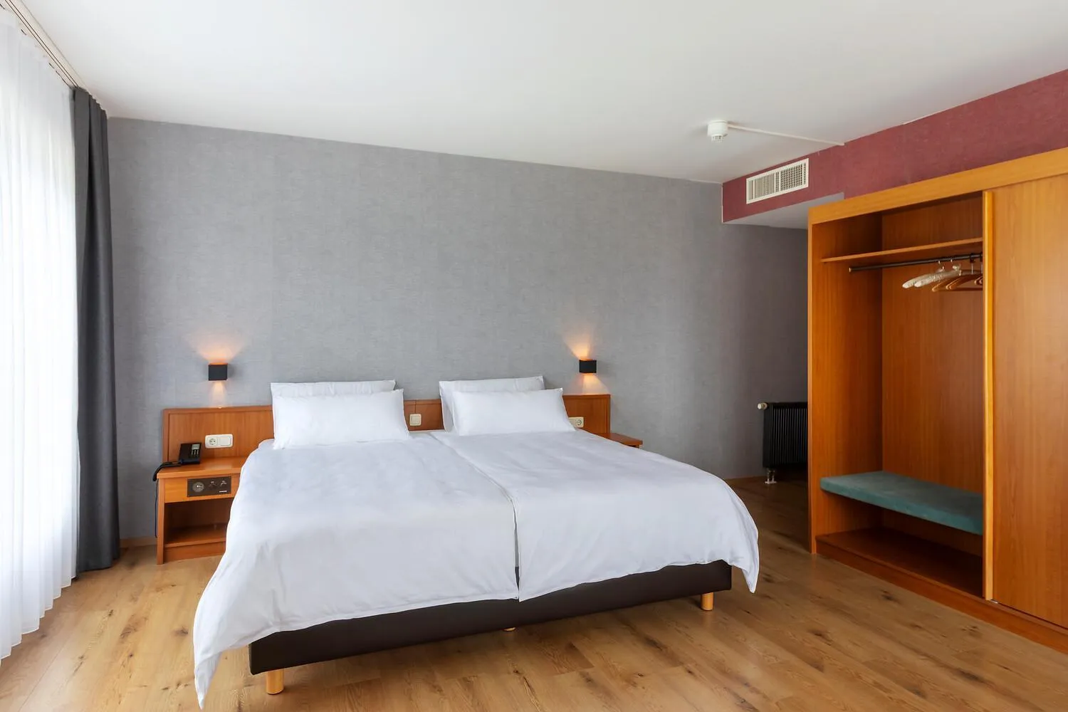 Bed in ACHAT Hotel Frankfurt Maintal