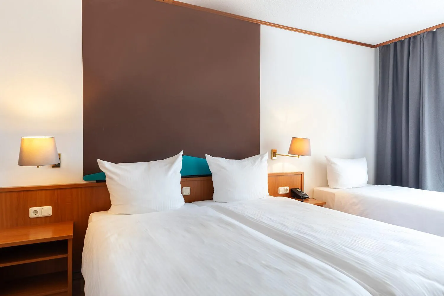 Bed in ACHAT Hotel Frankfurt Maintal