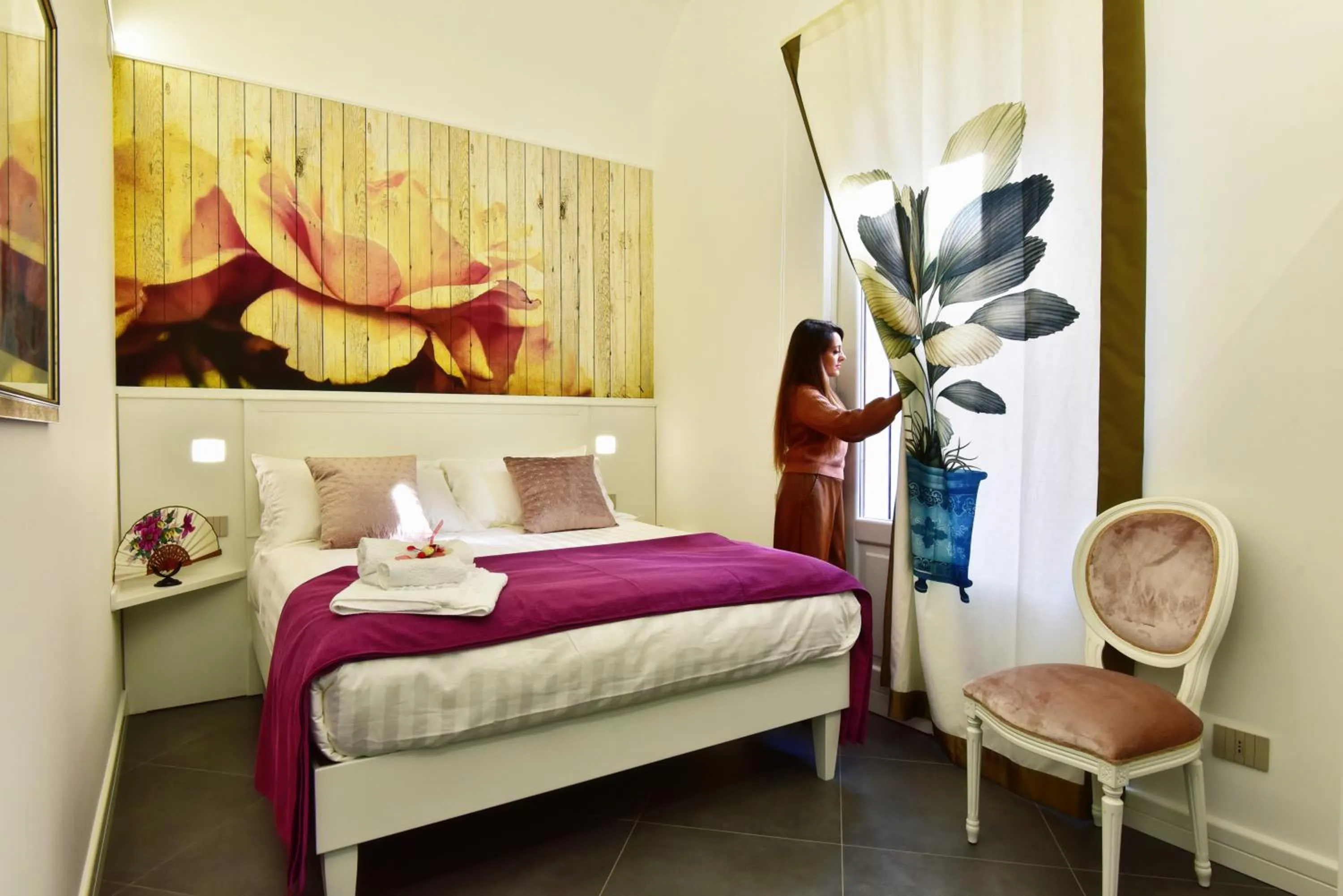 Bed in ANFITEATRO LE SUITES