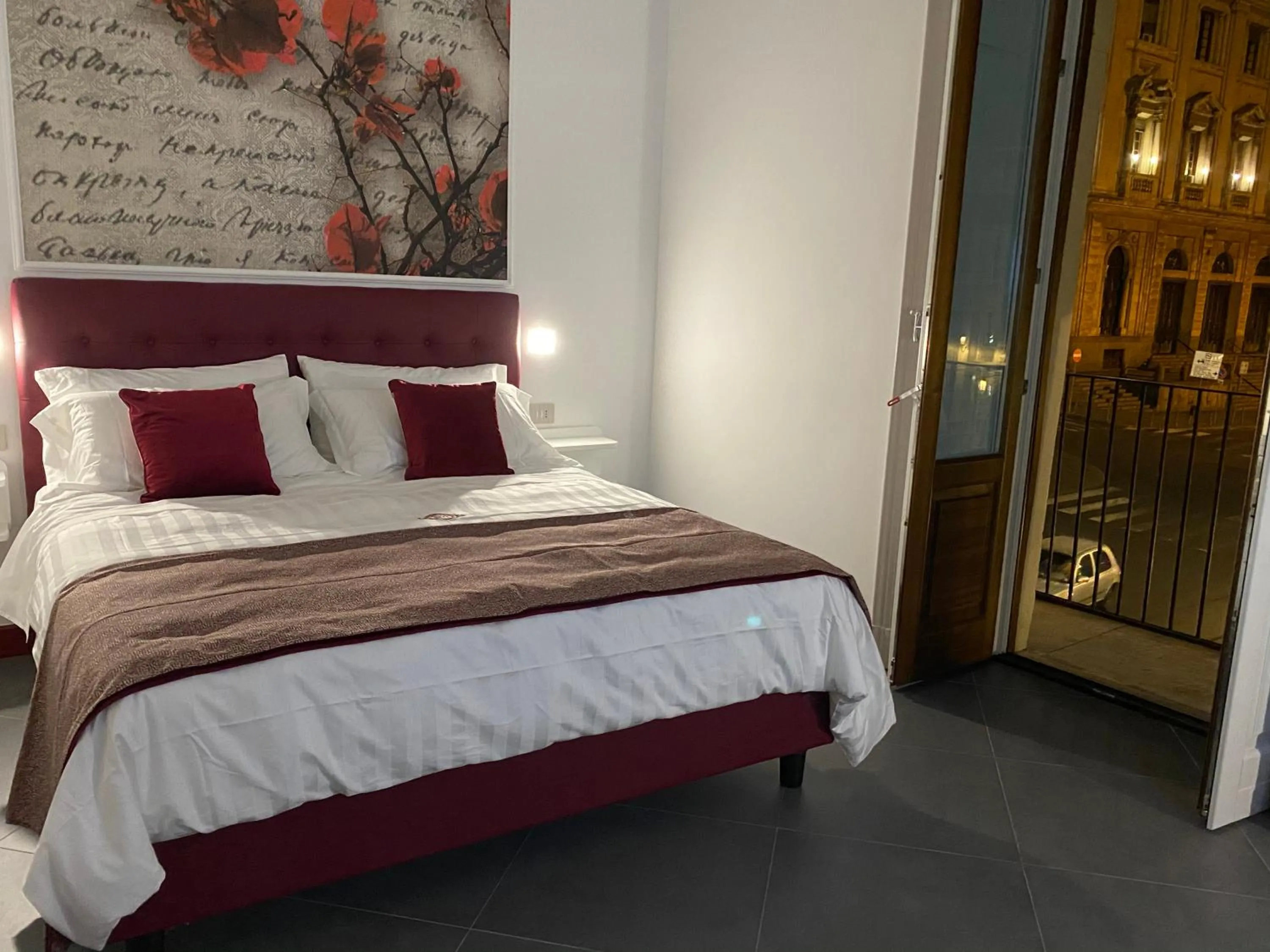 Bed in ANFITEATRO LE SUITES