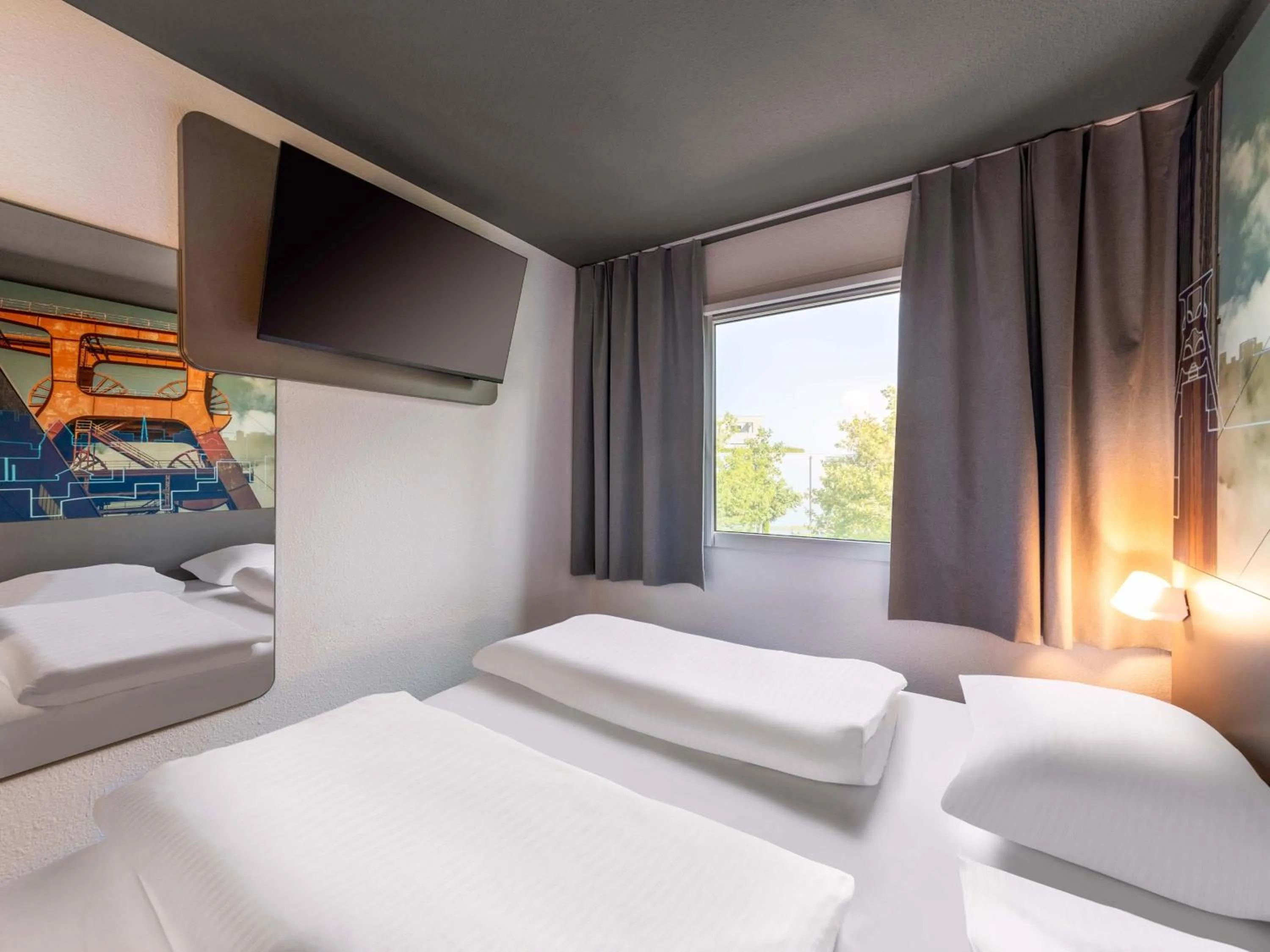 Photo of the whole room, Bed in B&B HOTEL Essen-Nord