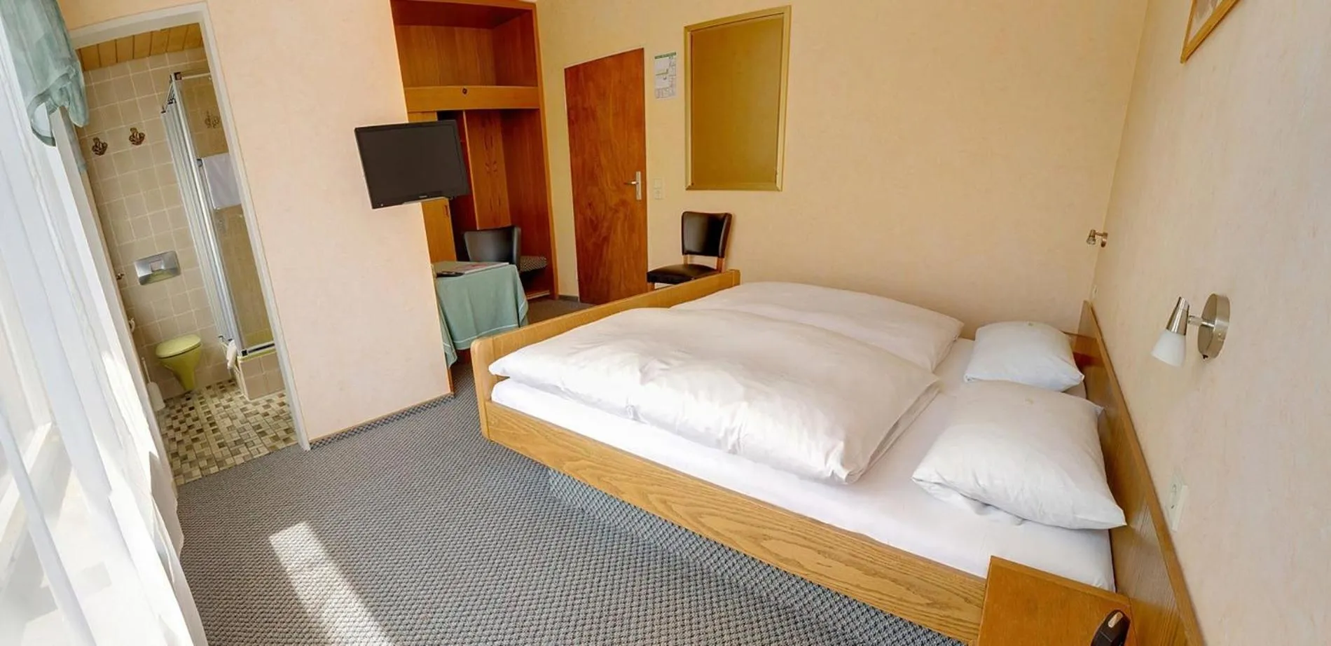 Bed in Hotel Keinath Stuttgart