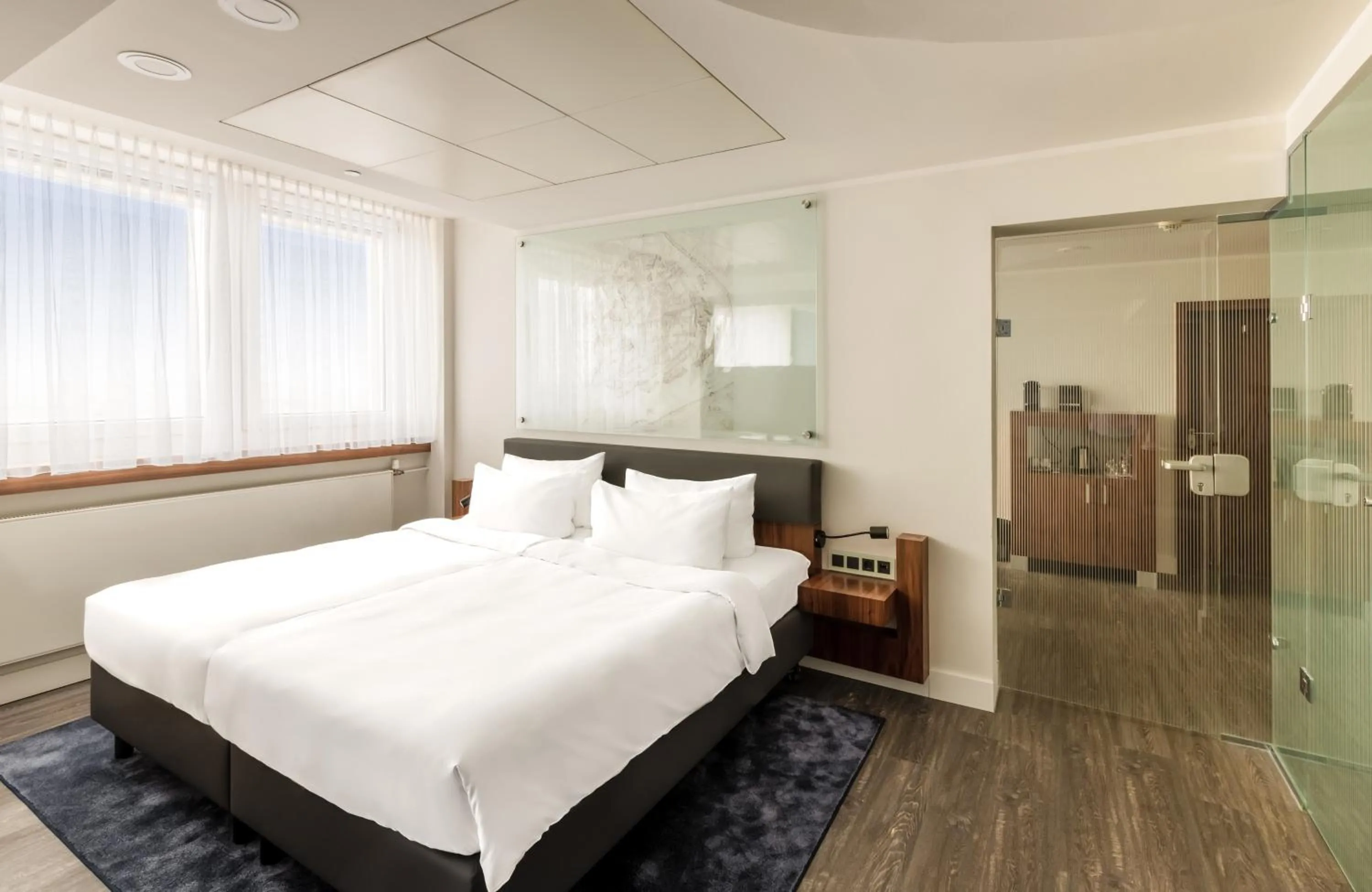 Bed in NYX Hotel Erfurt by Leonardo Hotels