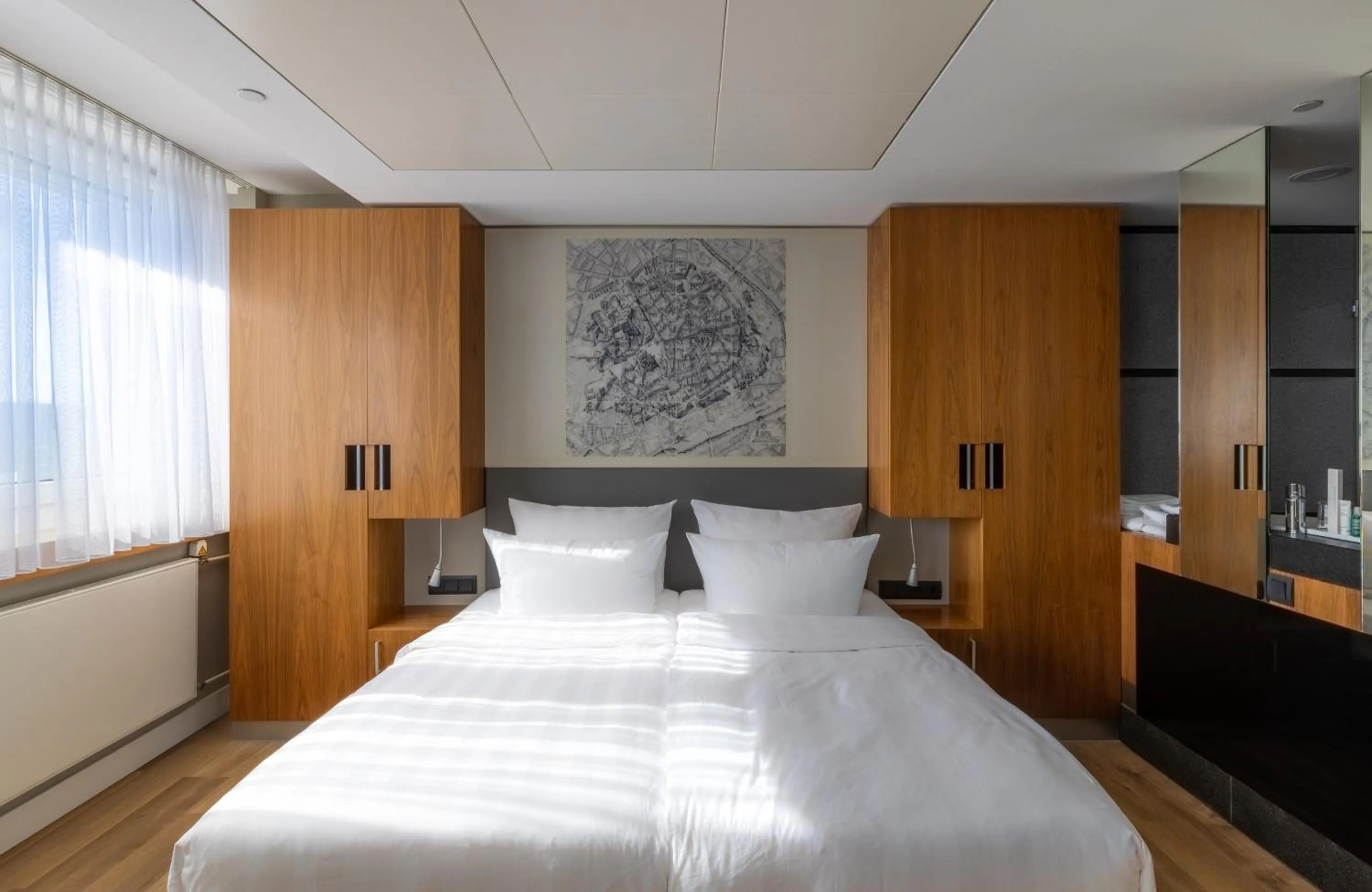 Bed in NYX Hotel Erfurt by Leonardo Hotels