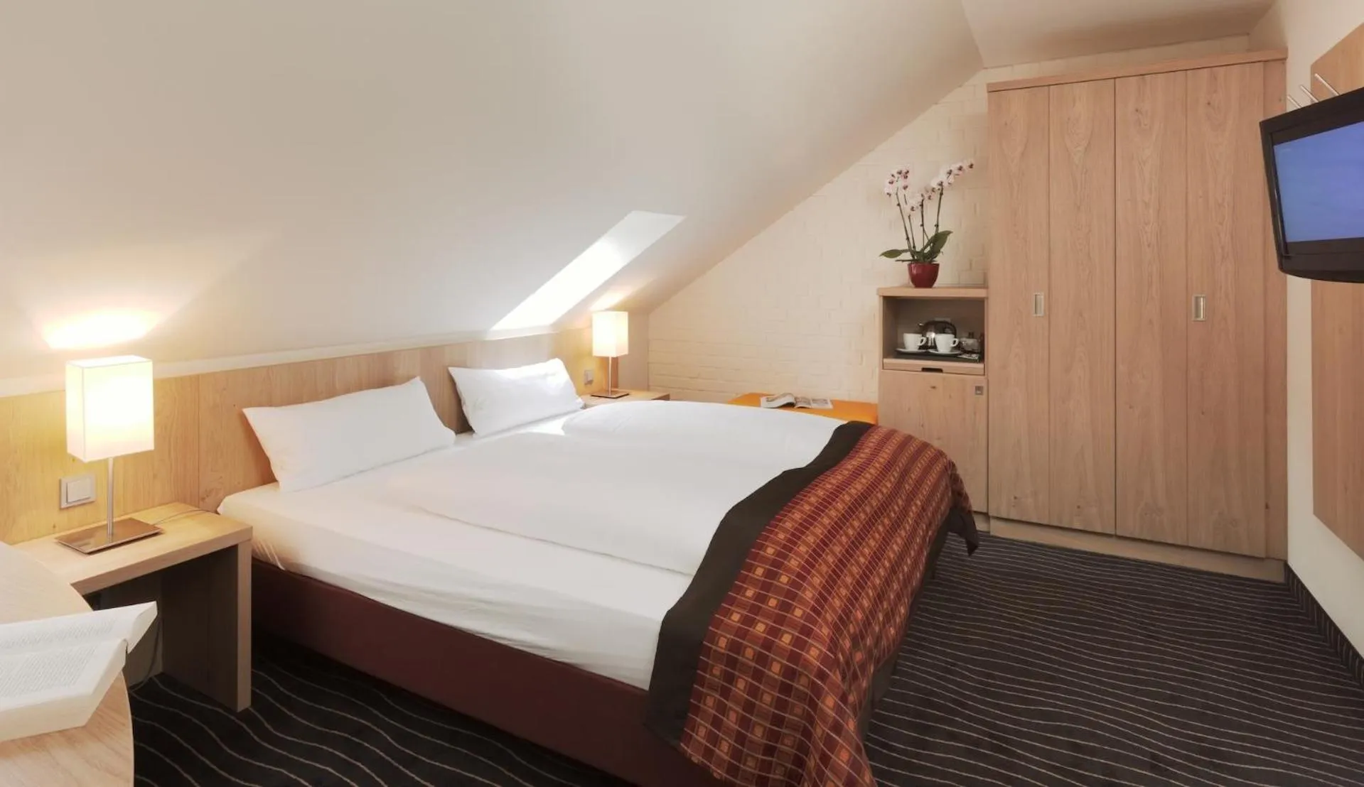 Photo of the whole room, Bed in Berghotel Hohe Mark