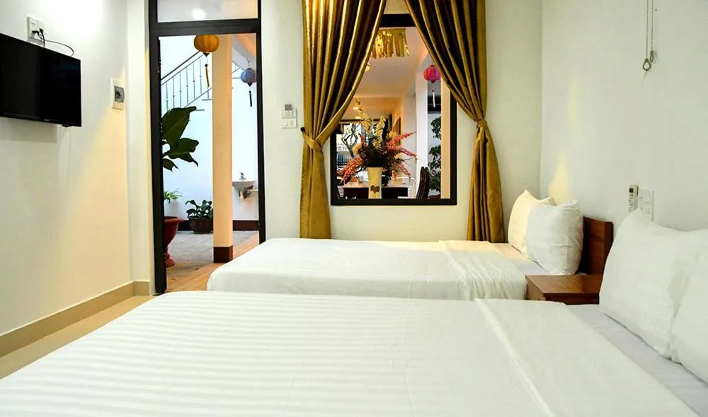 Bed in Asean Garden Homestay Hue