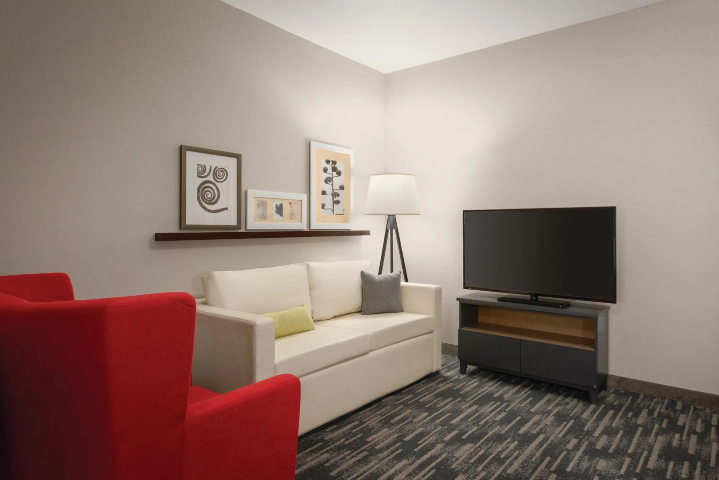 Living room in Country Inn & Suites by Radisson, Oklahoma City - Bricktown, OK