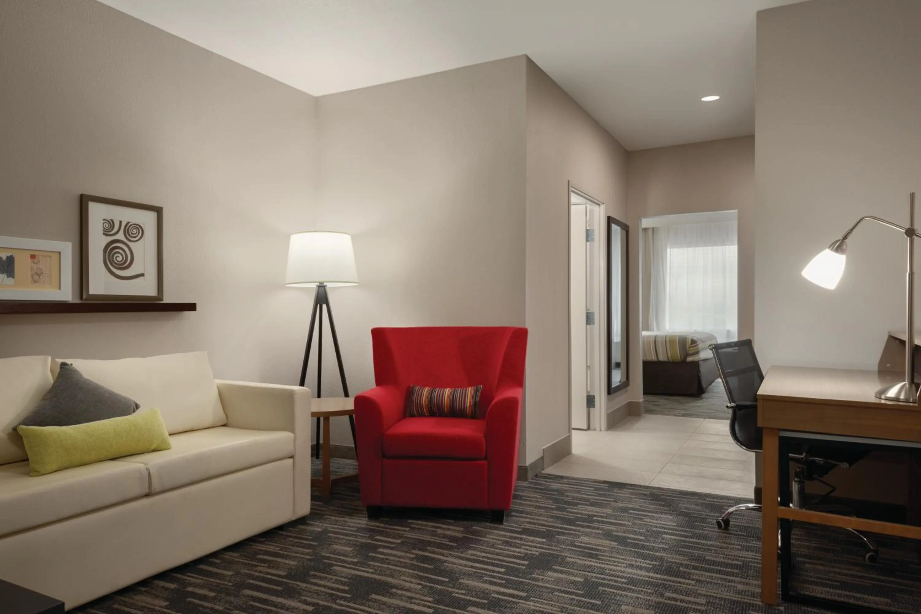 Living room in Country Inn & Suites by Radisson, Oklahoma City - Bricktown, OK