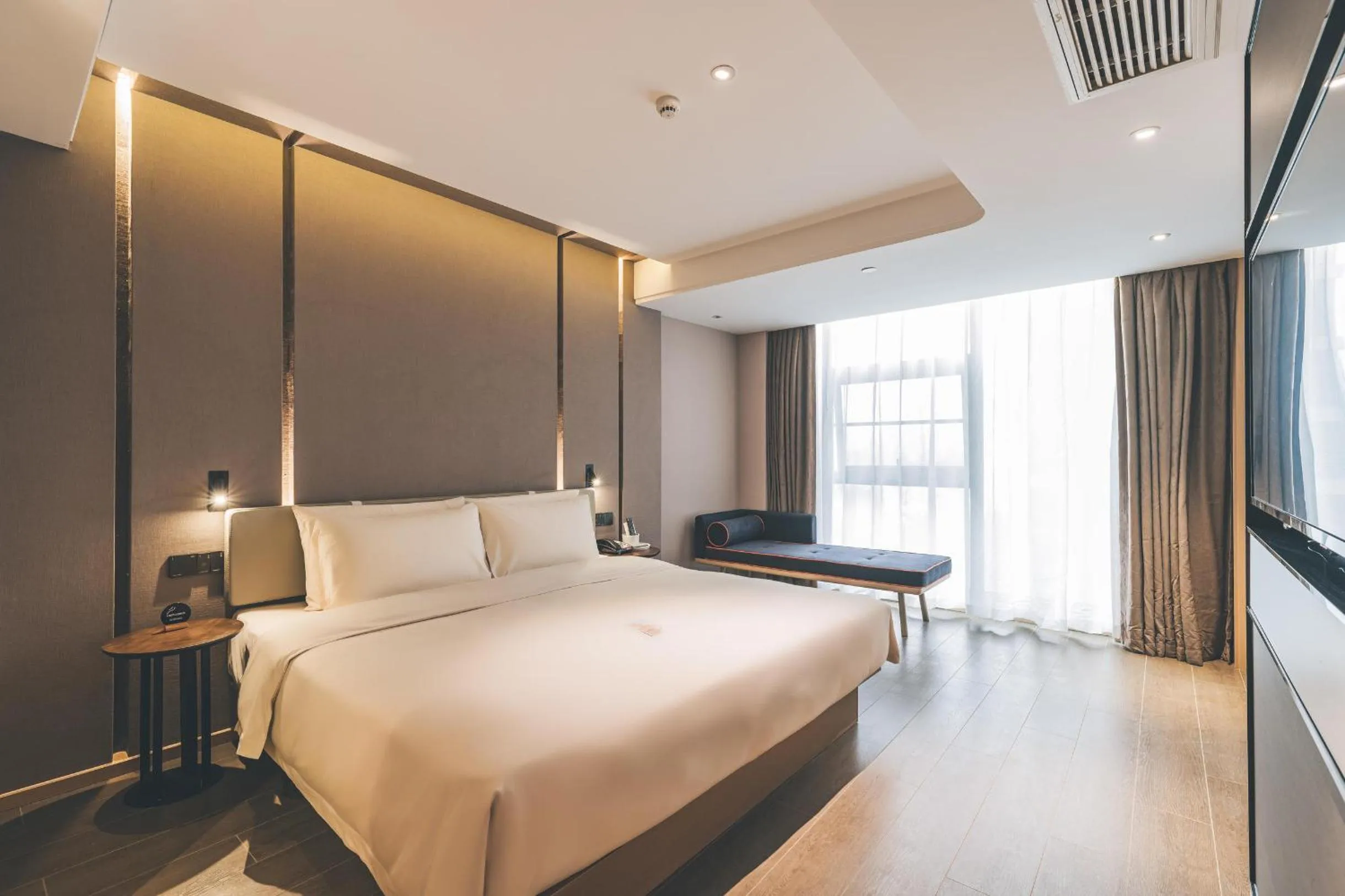 Bed in Atour Hotel Huzhou Dongwu