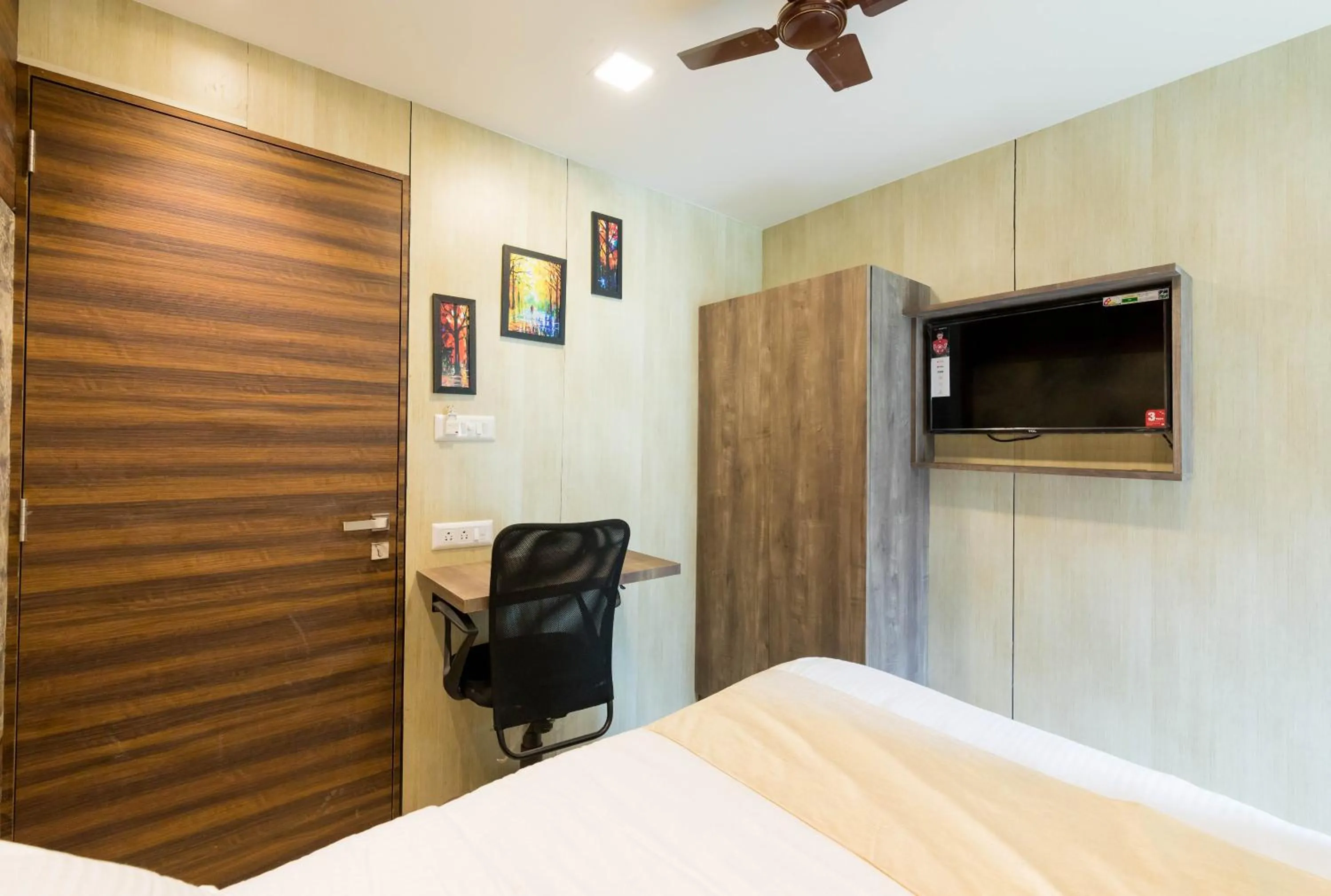 Photo of the whole room in Hotel New Sky Palace Residency- Near International Airport Andheri East