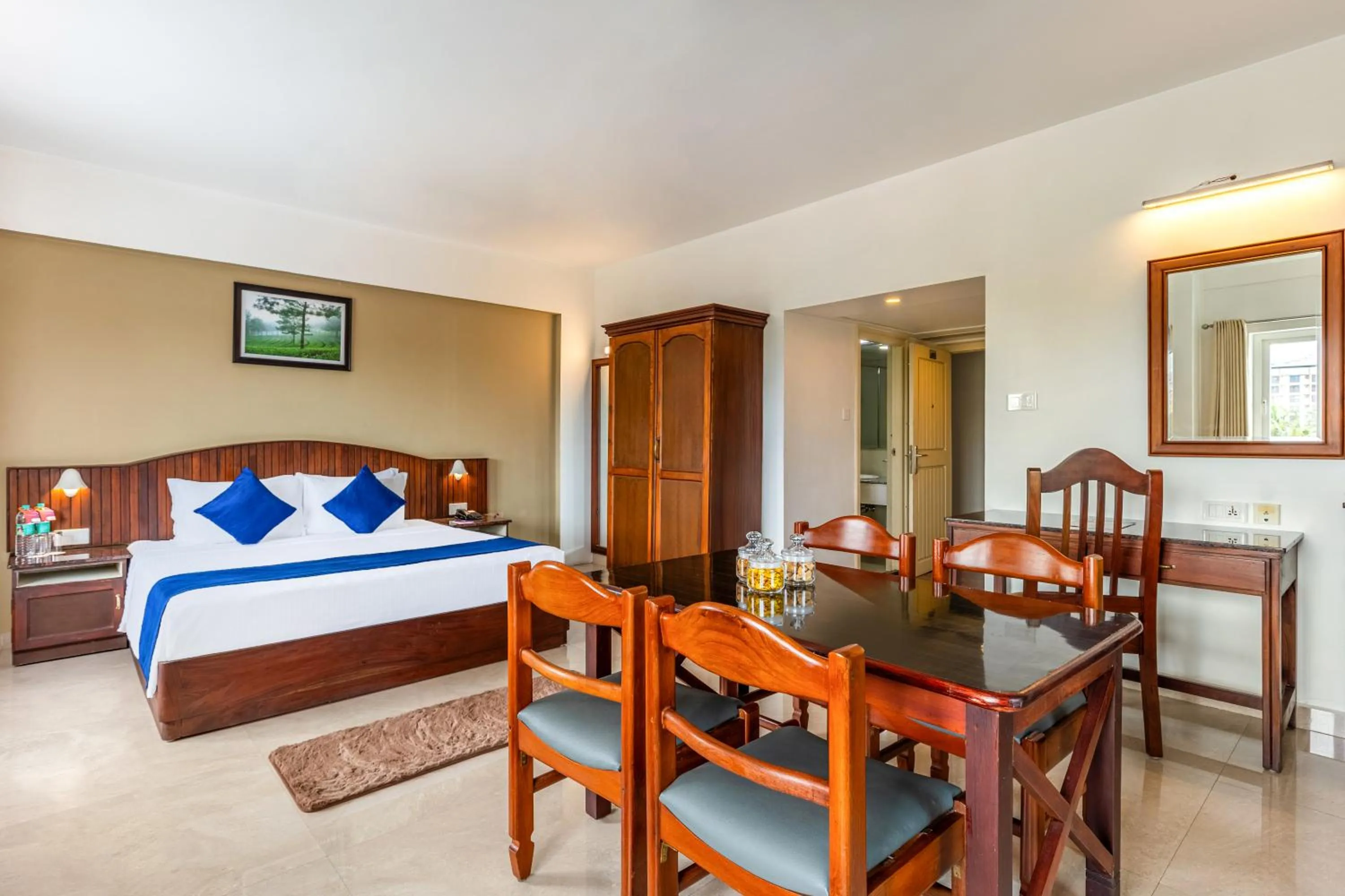 Dining area, Bed in Sterling Darshan Guruvayur