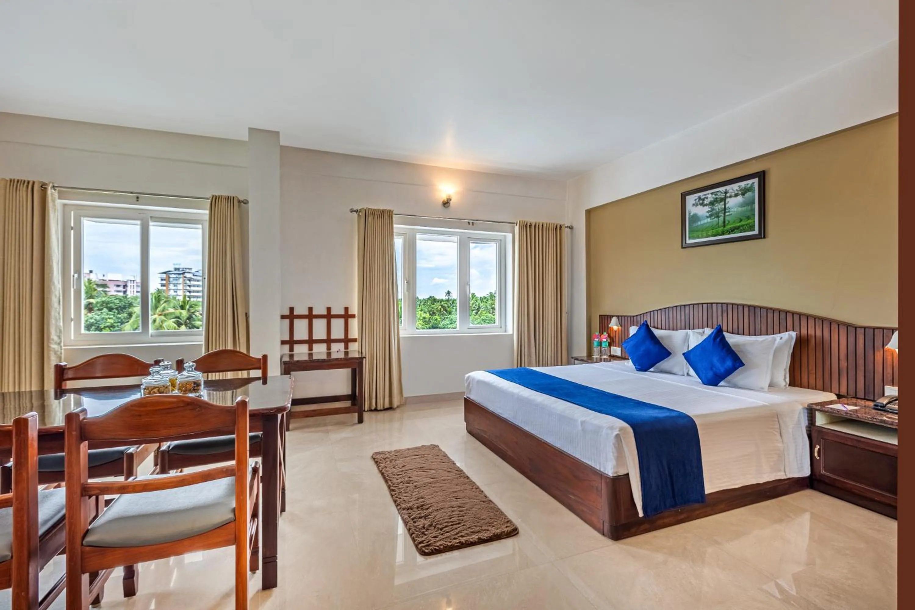 Photo of the whole room, Bed in Sterling Darshan Guruvayur