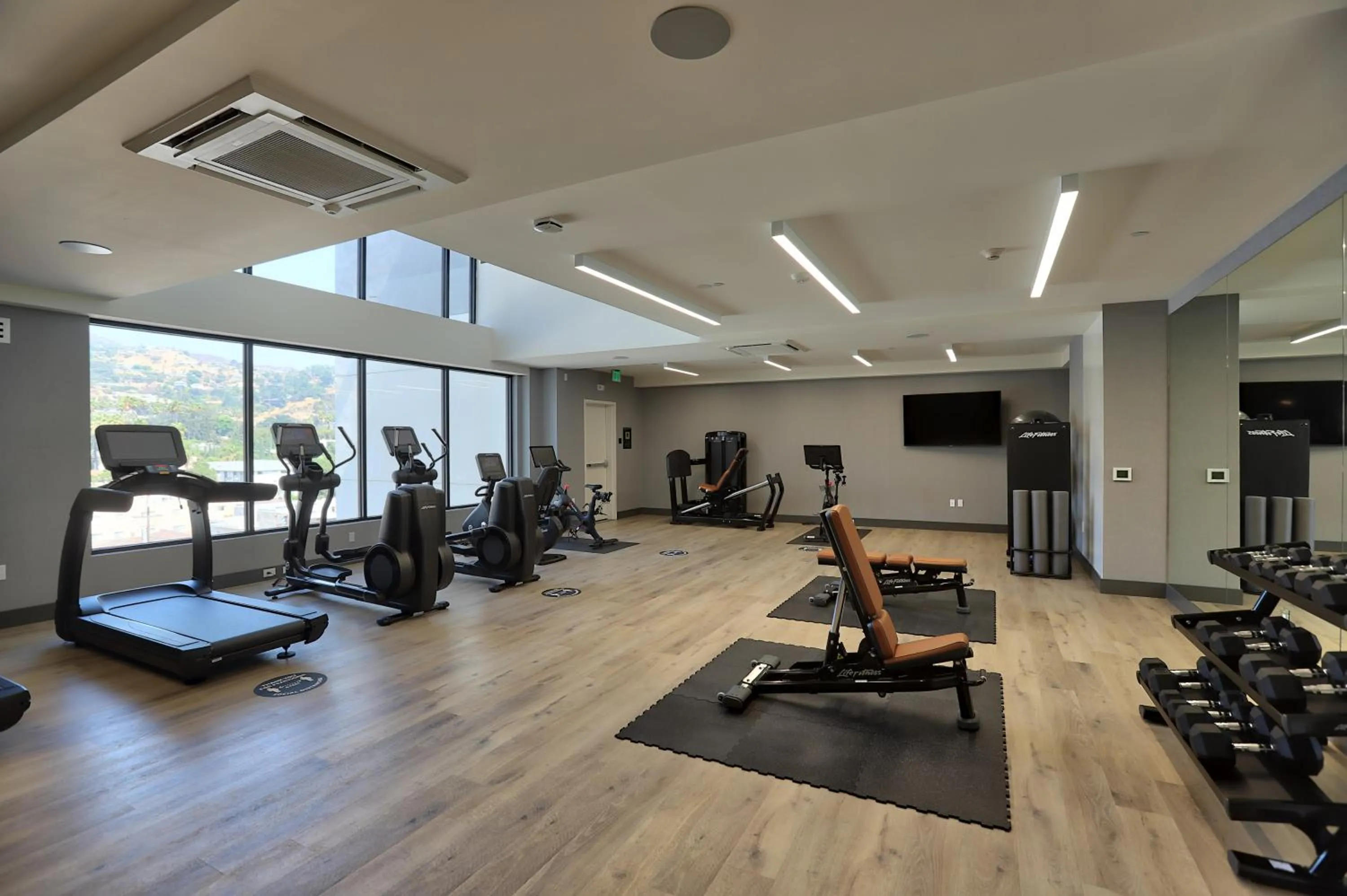 Fitness centre/facilities in The Glenmark, Glendale, a Tribute Portfolio Hotel