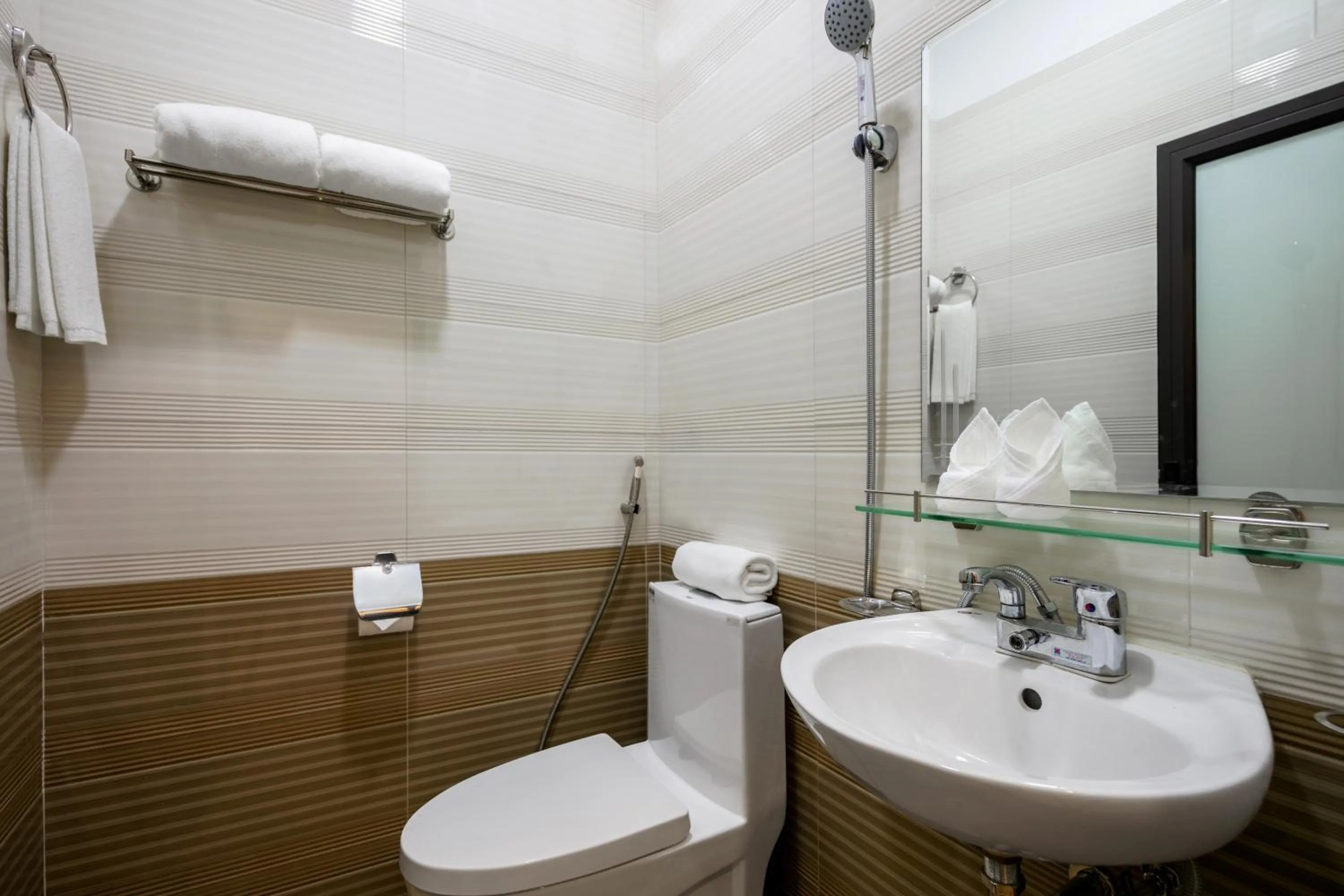 Toilet in Patel Hotel Hanoi