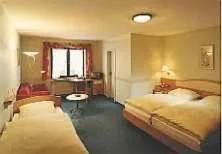 Bed in Hotel-garni-Kachelburg