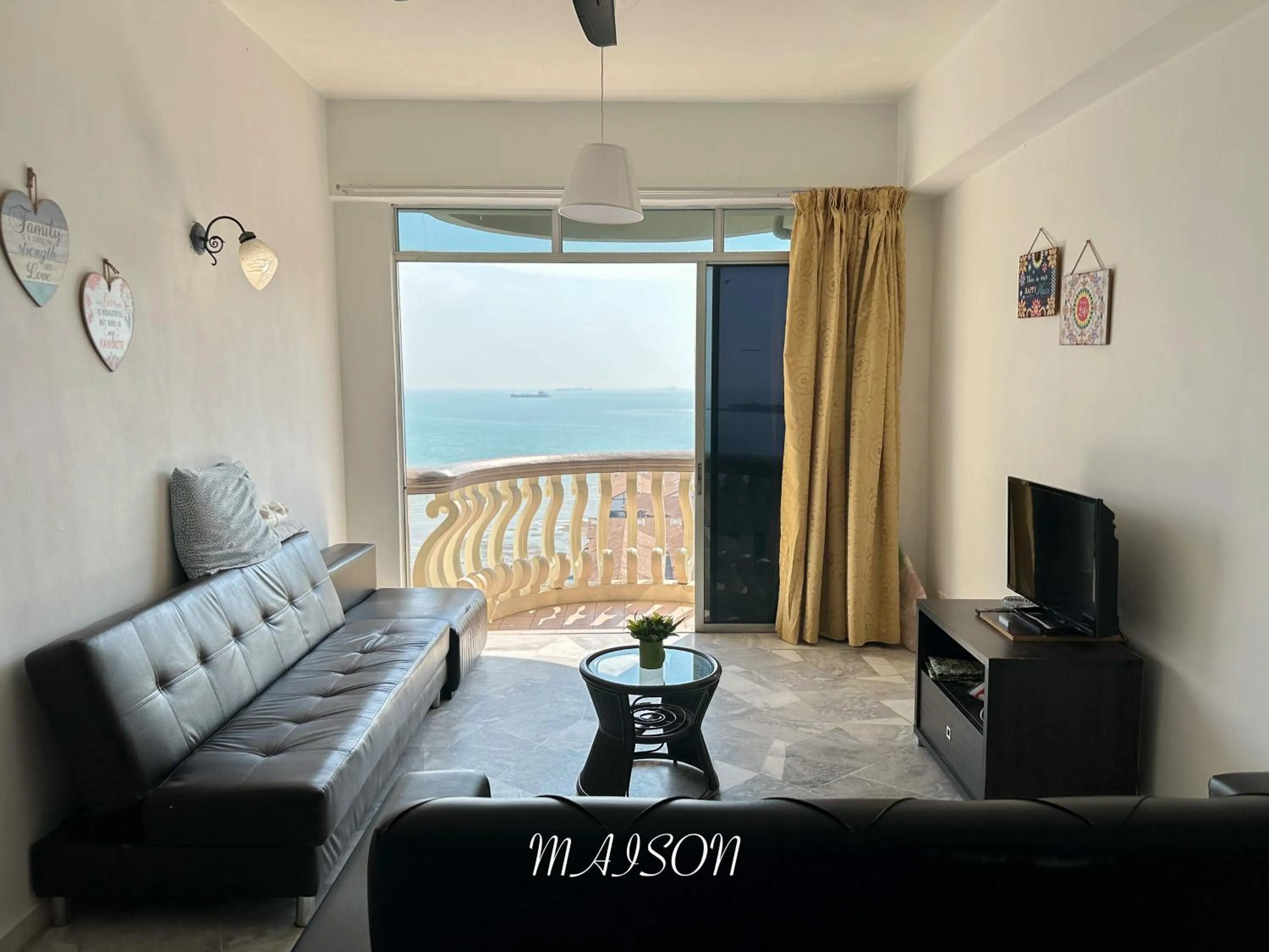Communal lounge/ TV room in Maison Seaview Suites Port Dickson