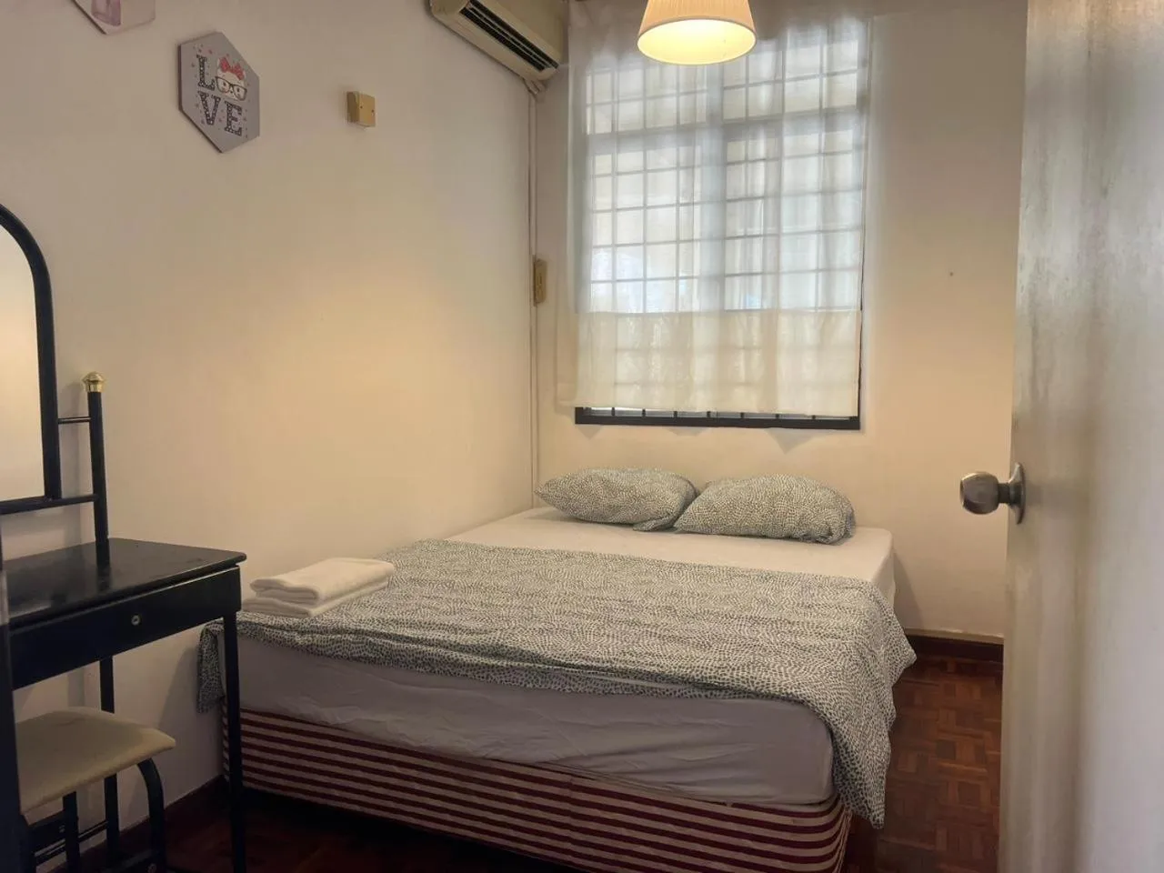 Bed in Maison Seaview Suites Port Dickson