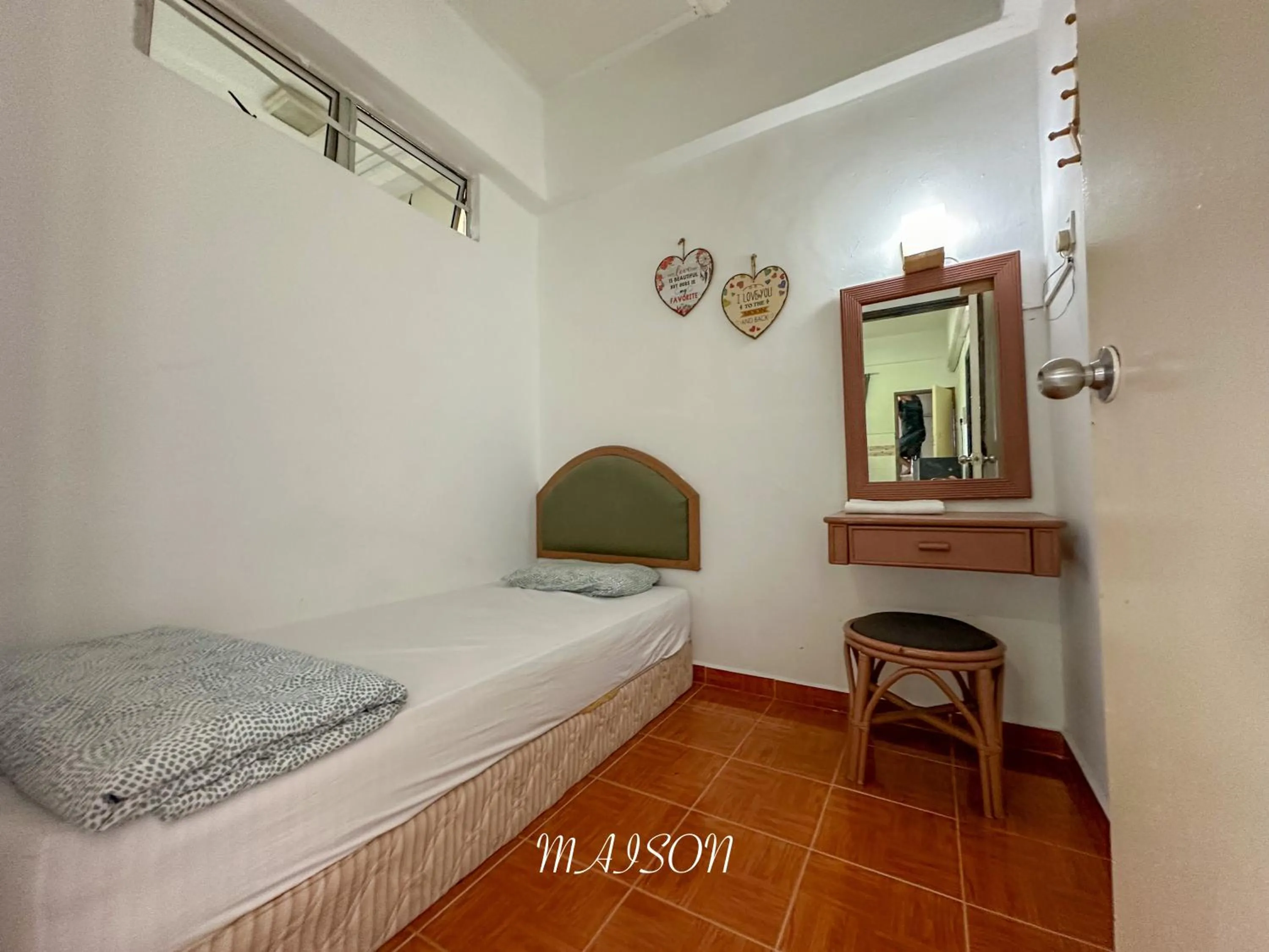 Bed in Maison Seaview Suites Port Dickson