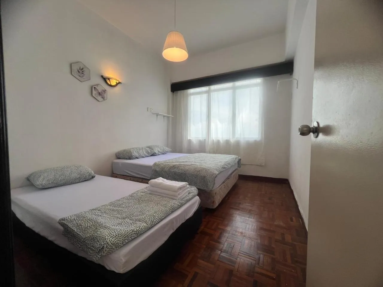 Bed in Maison Seaview Suites Port Dickson