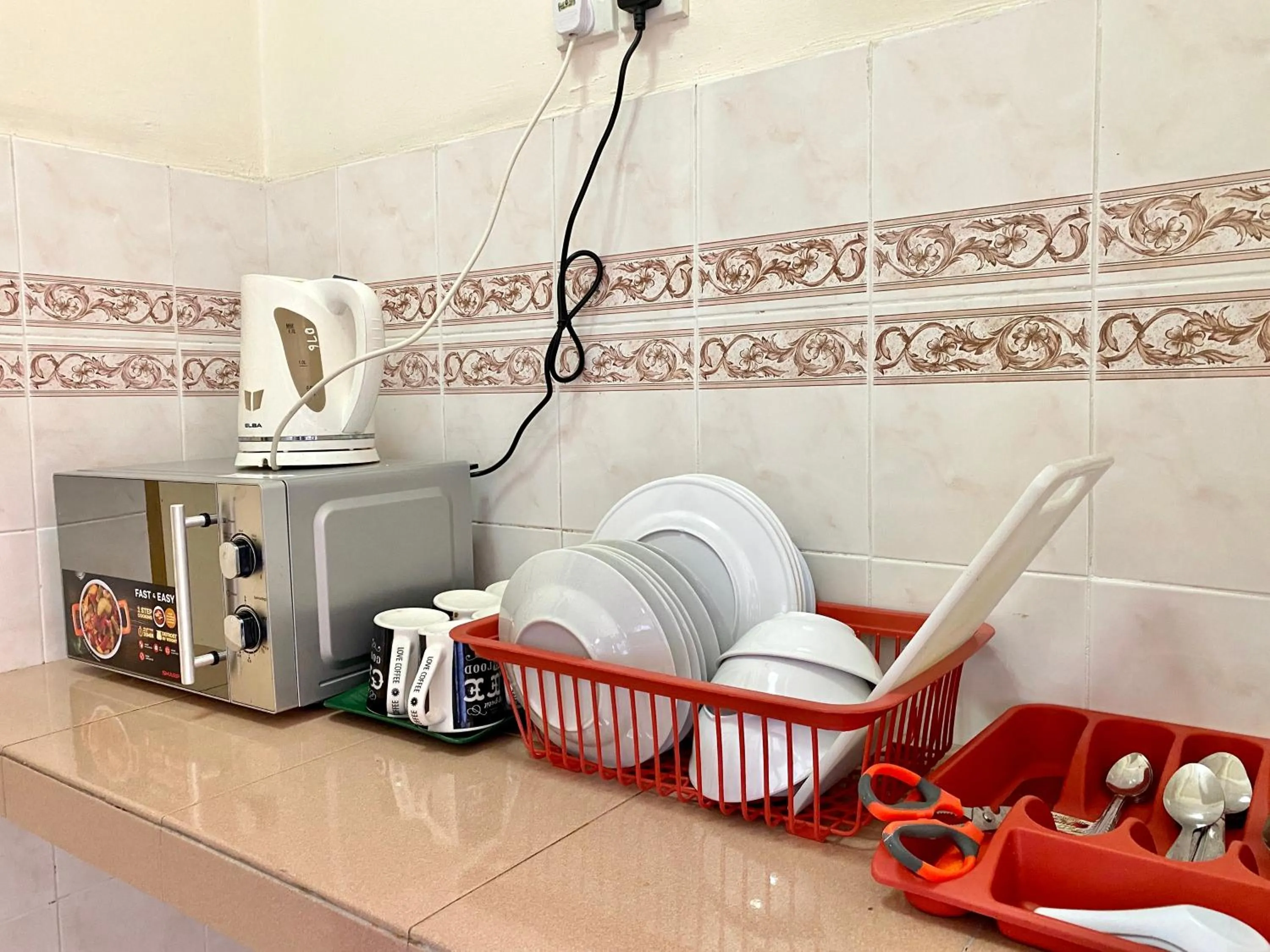 Kitchen or kitchenette in Maison Seaview Suites Port Dickson