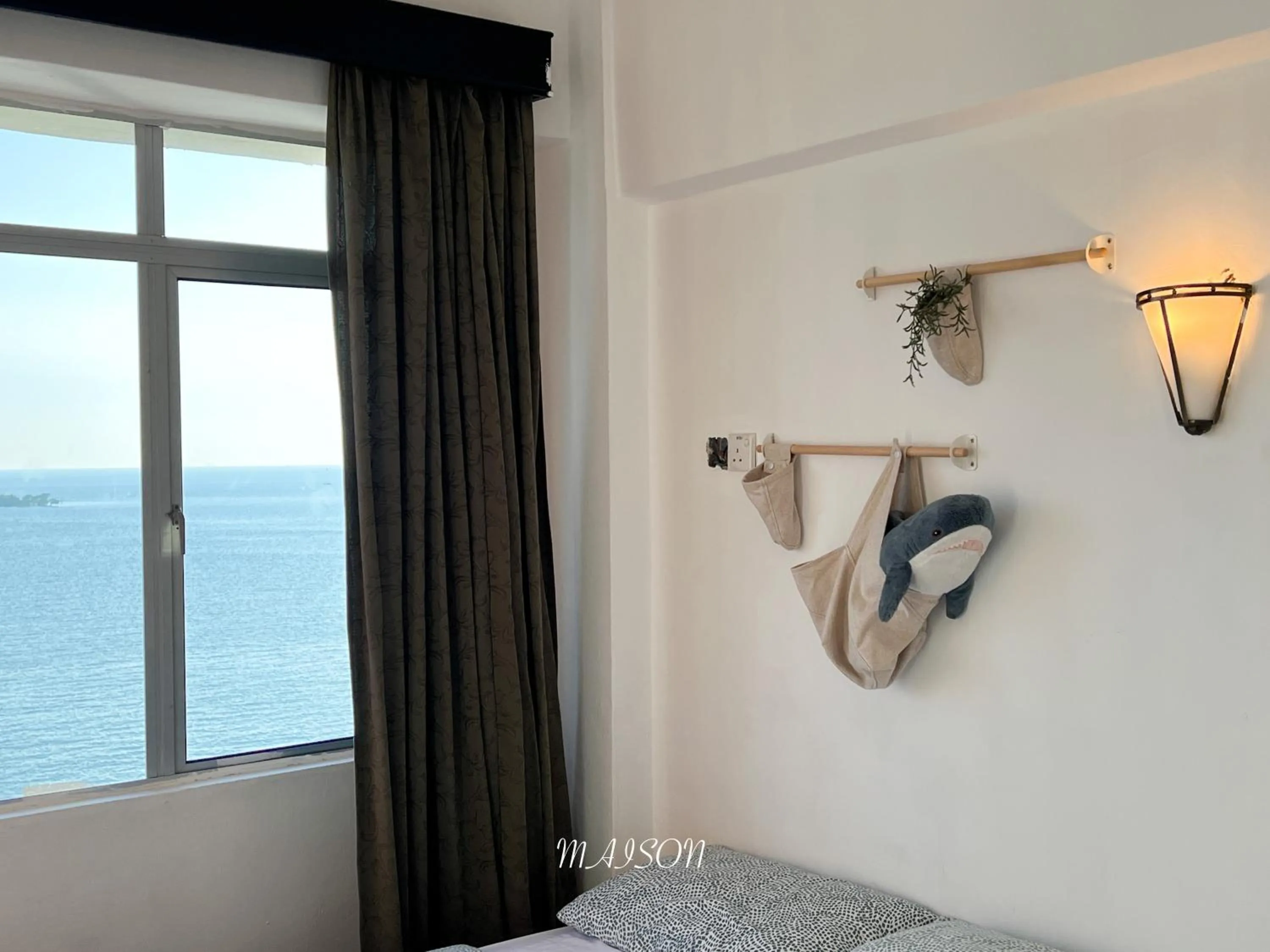 Bed in Maison Seaview Suites Port Dickson