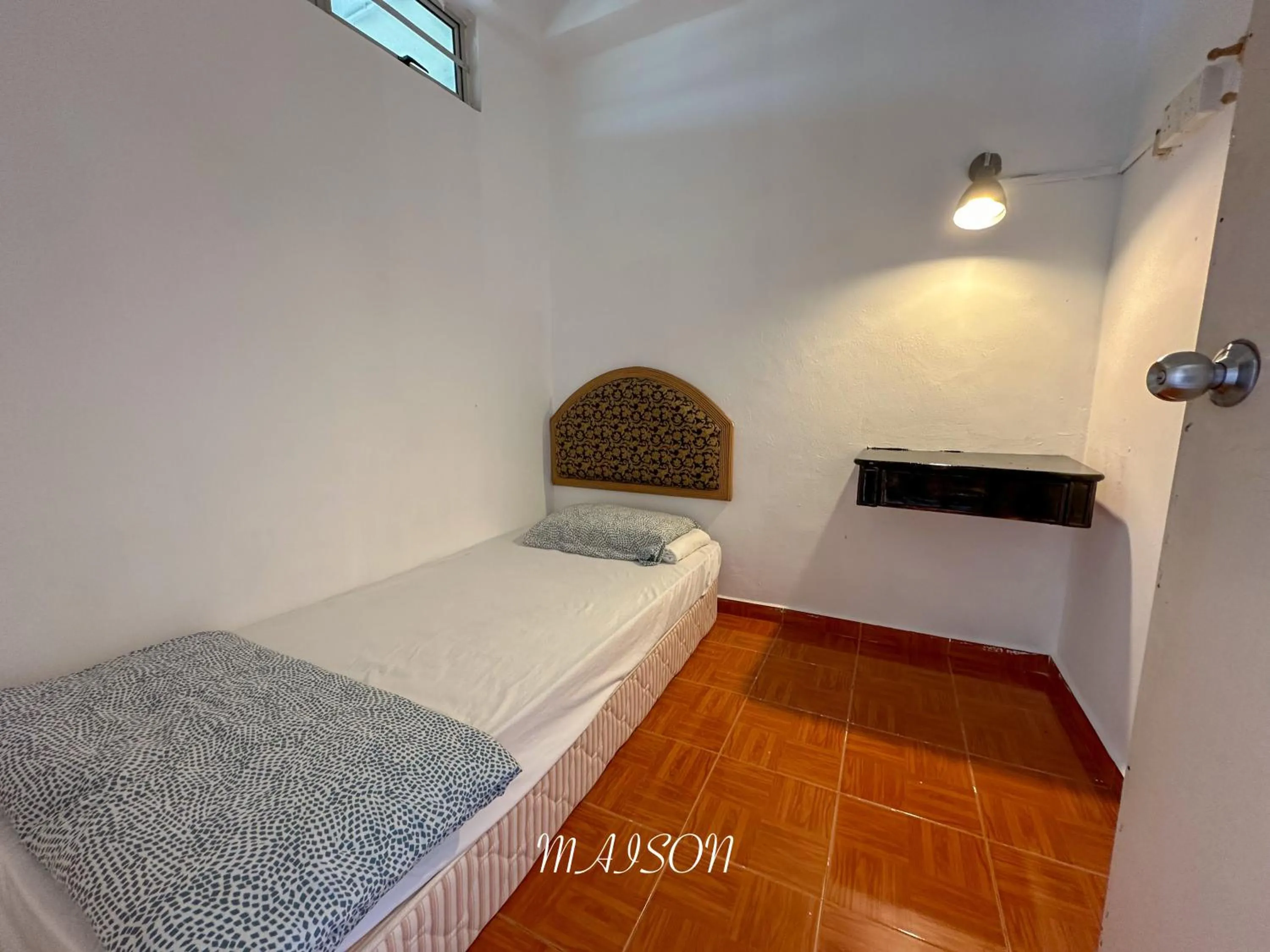 Bed in Maison Seaview Suites Port Dickson