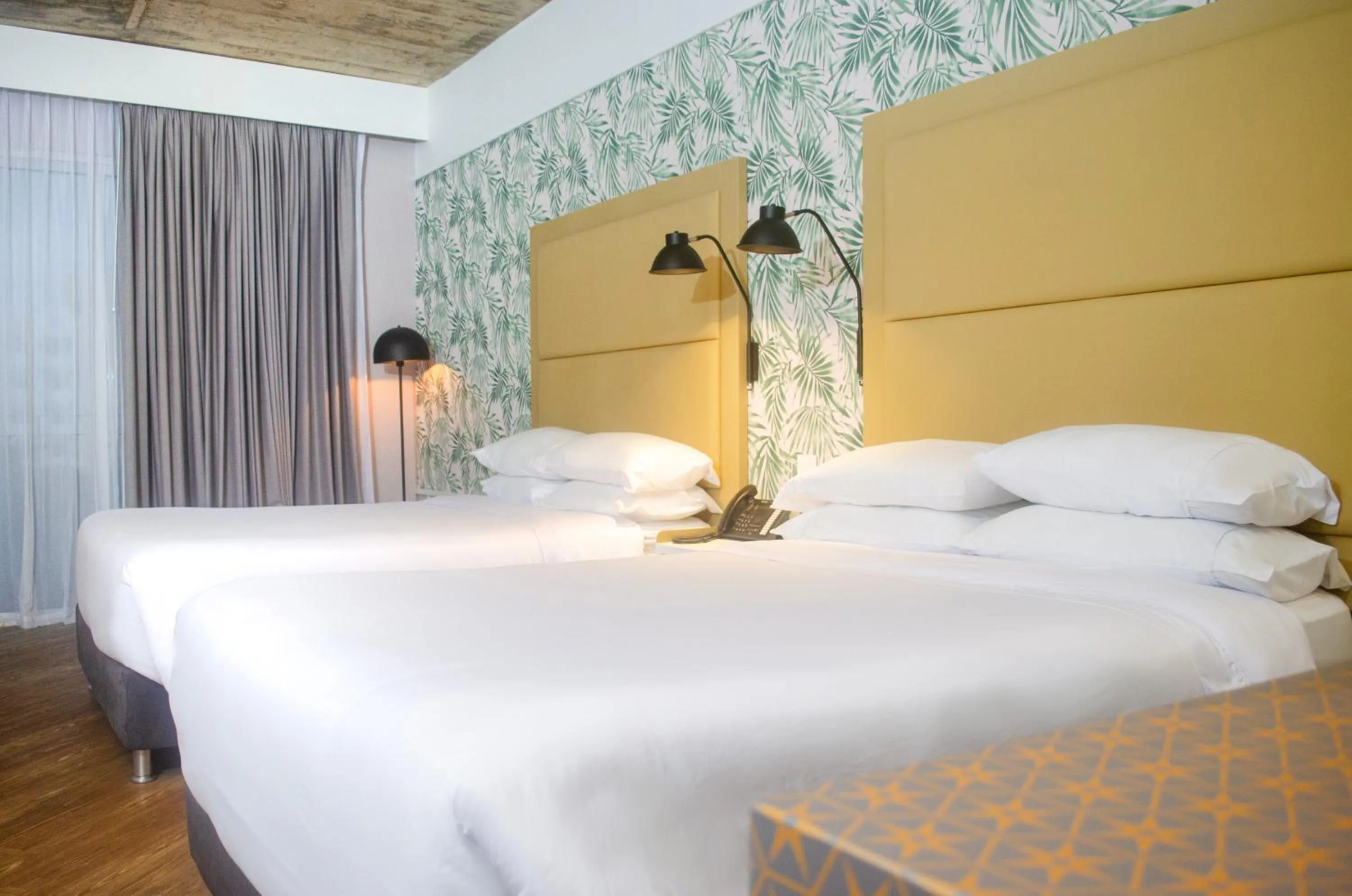 Bed in Faranda Collection Barranquilla, a member of Radisson Individuals