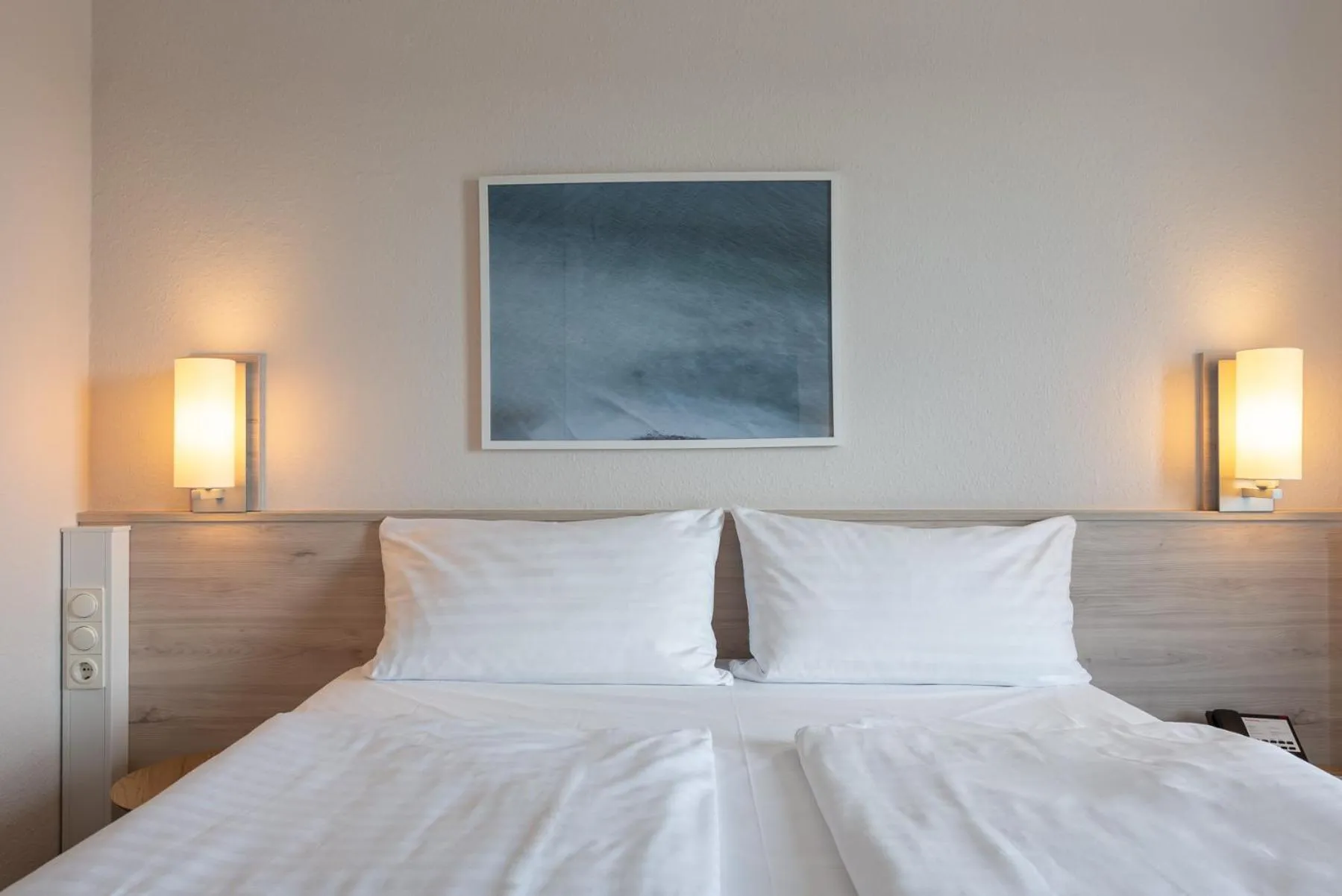 Bed in IntercityHotel Kiel