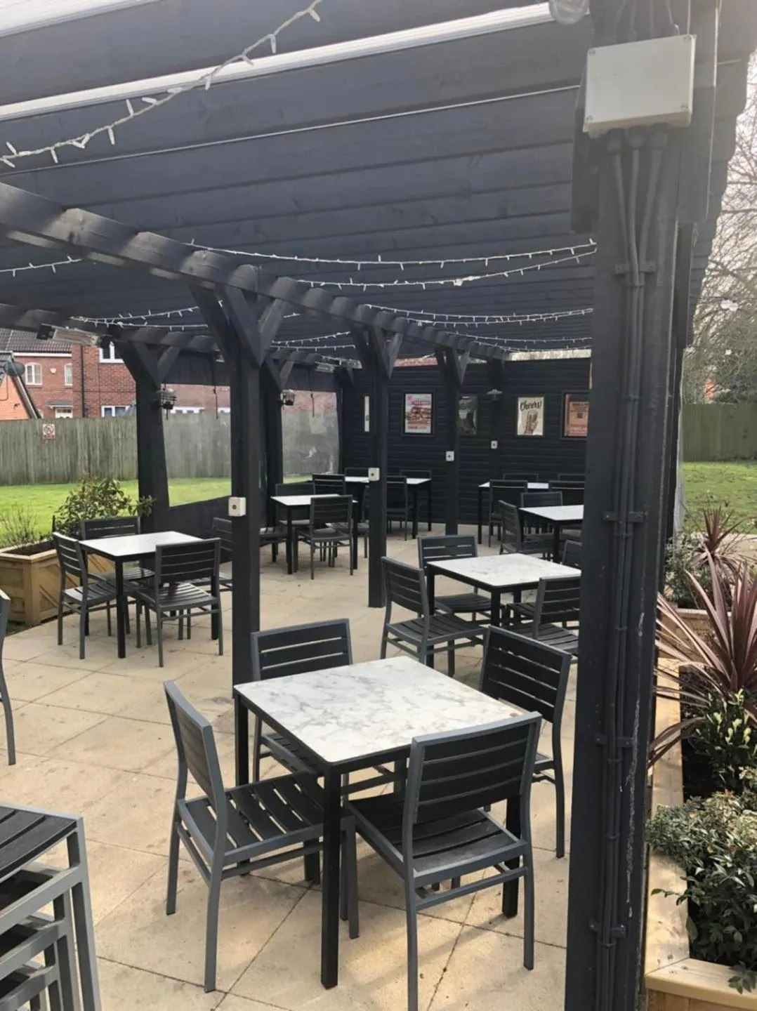 Seating area in The Bowman by Greene King Inns