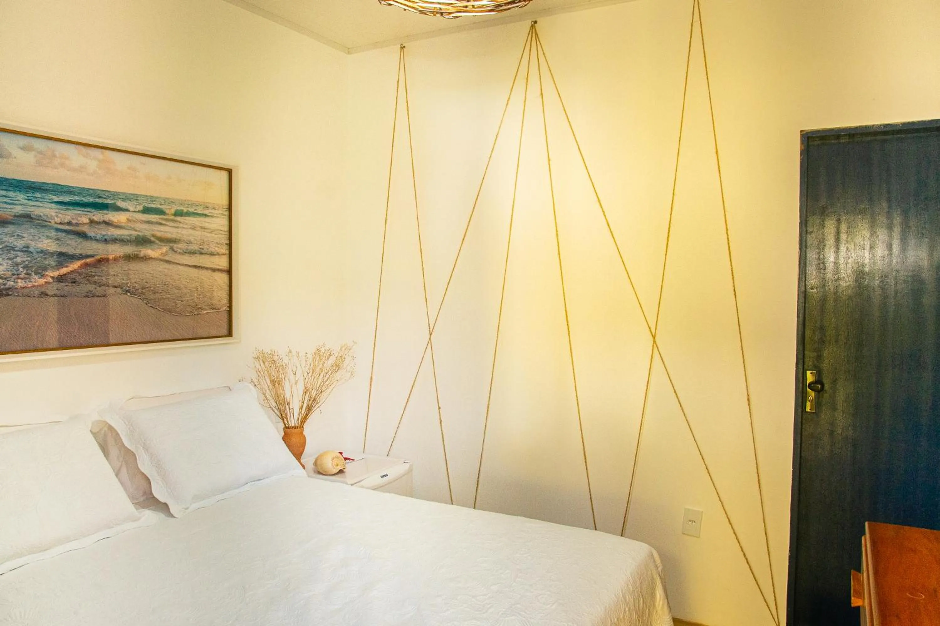 Bed in POUSADA PONTA DA ASA