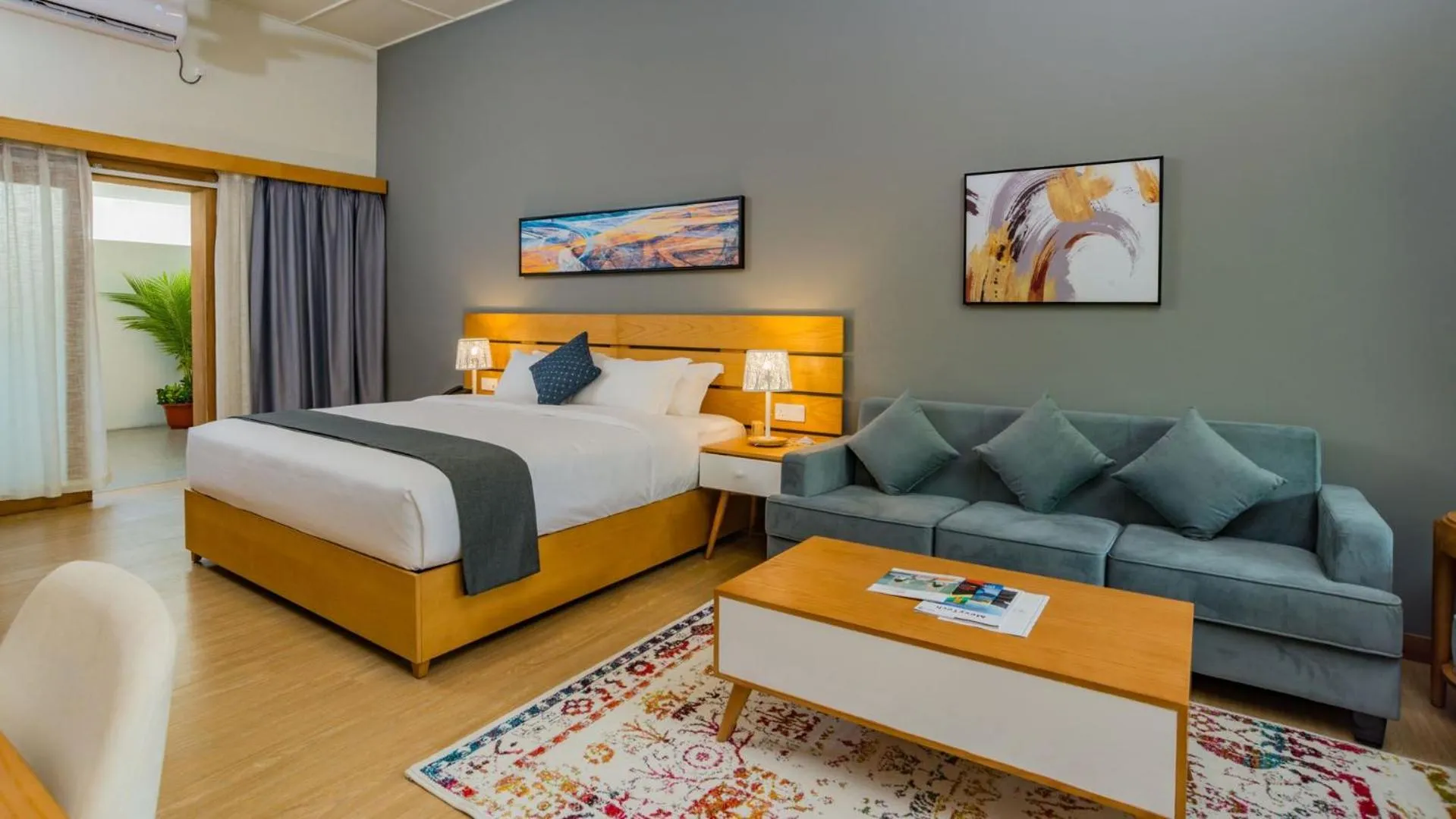 Property building, Bed in Fiyavalhu Resort Maldives