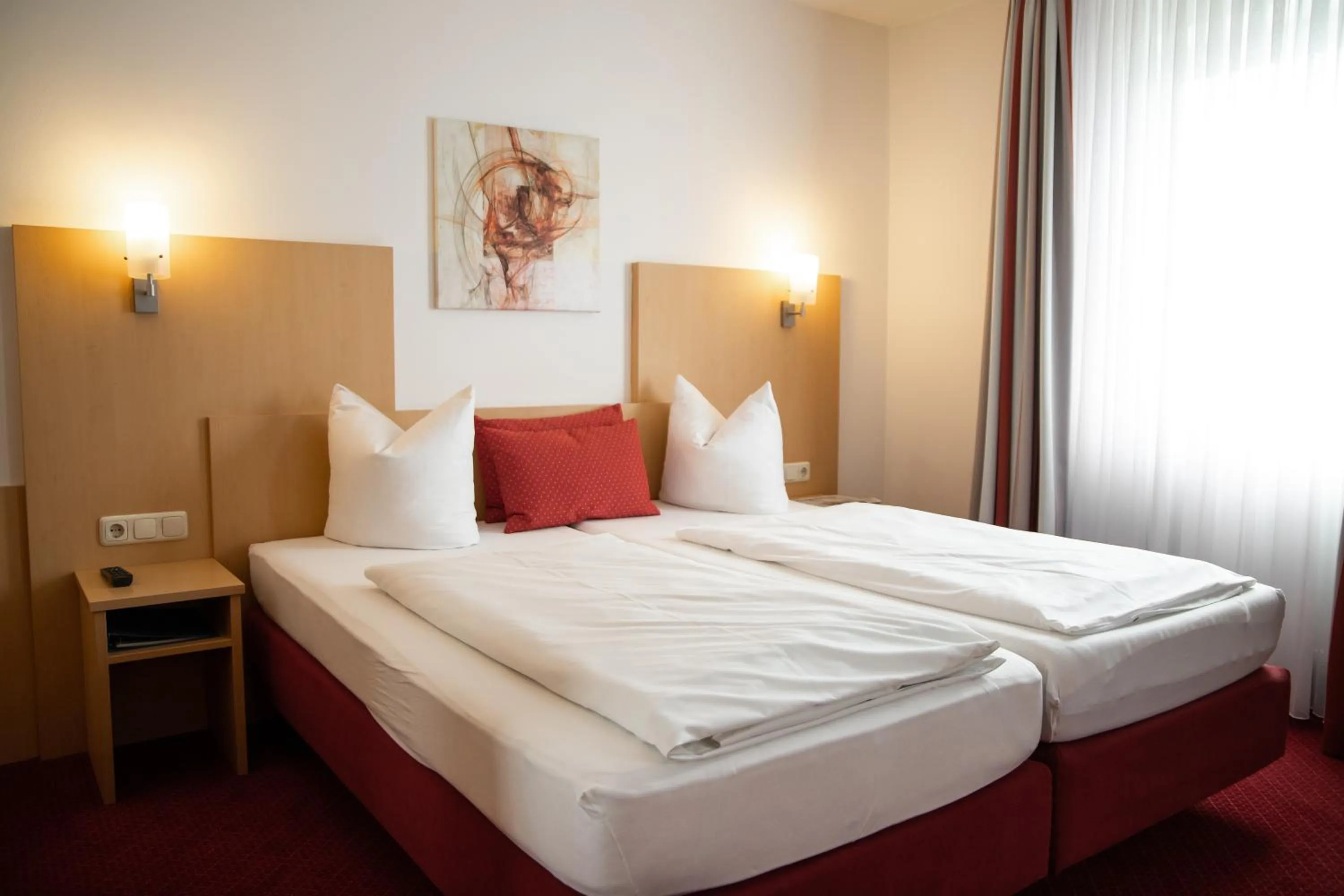 Photo of the whole room, Bed in Hotel Bettina garni