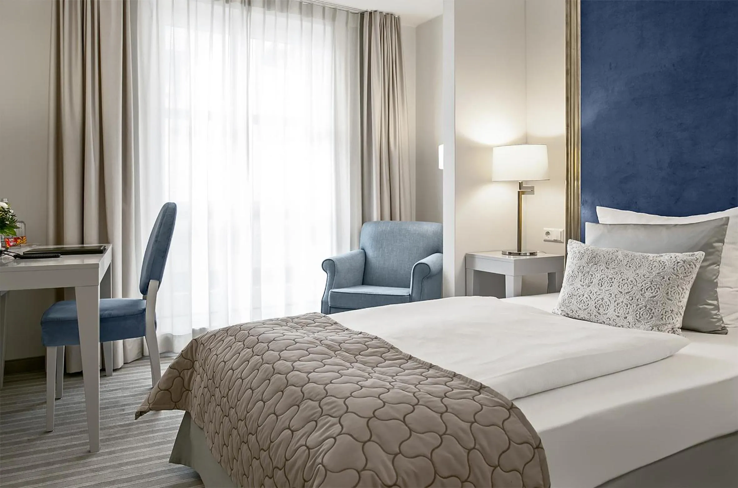 Photo of the whole room, Bed in Dorint Parkhotel Meißen