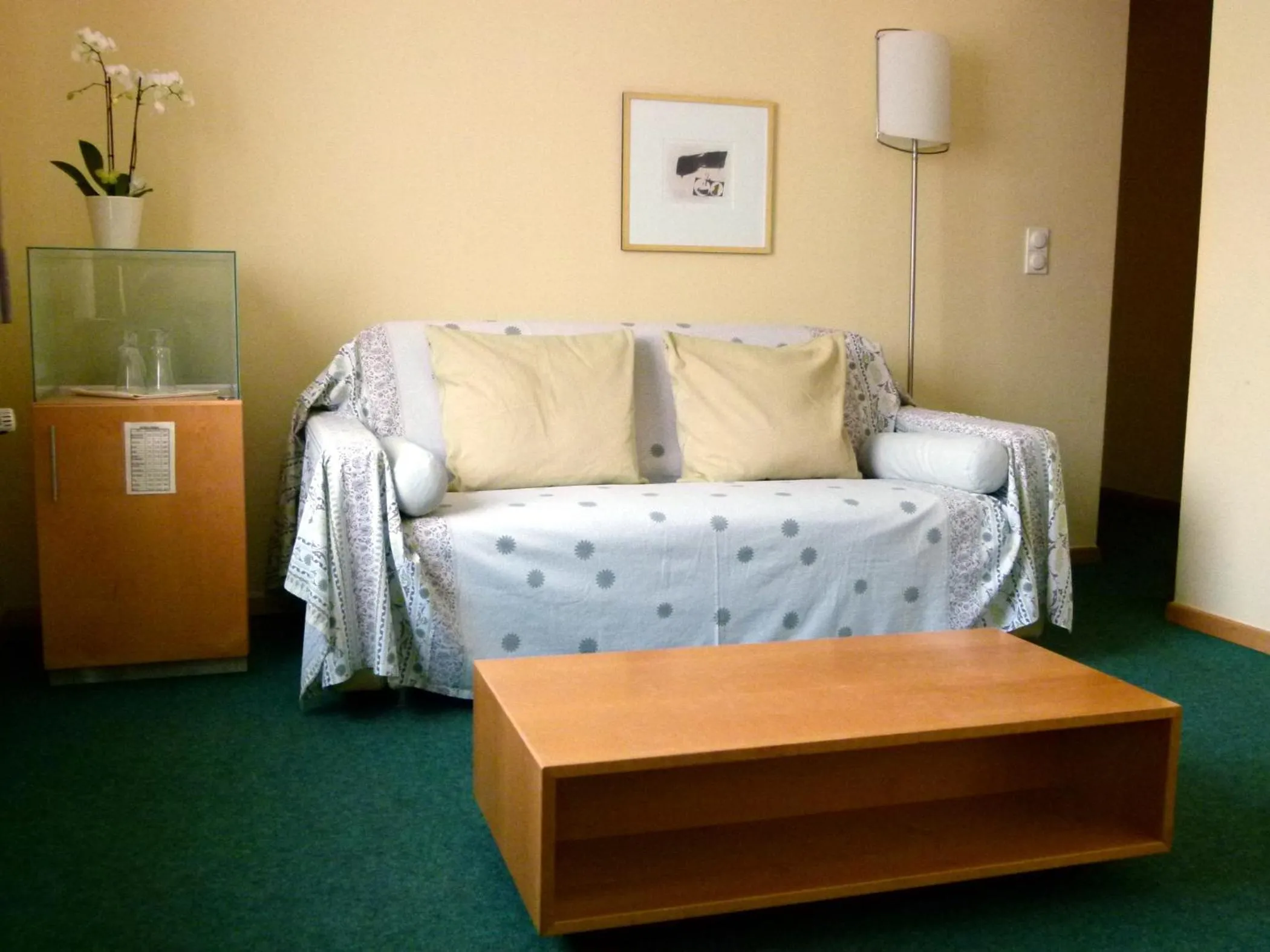 Seating area, Bed in Hotel Markt3