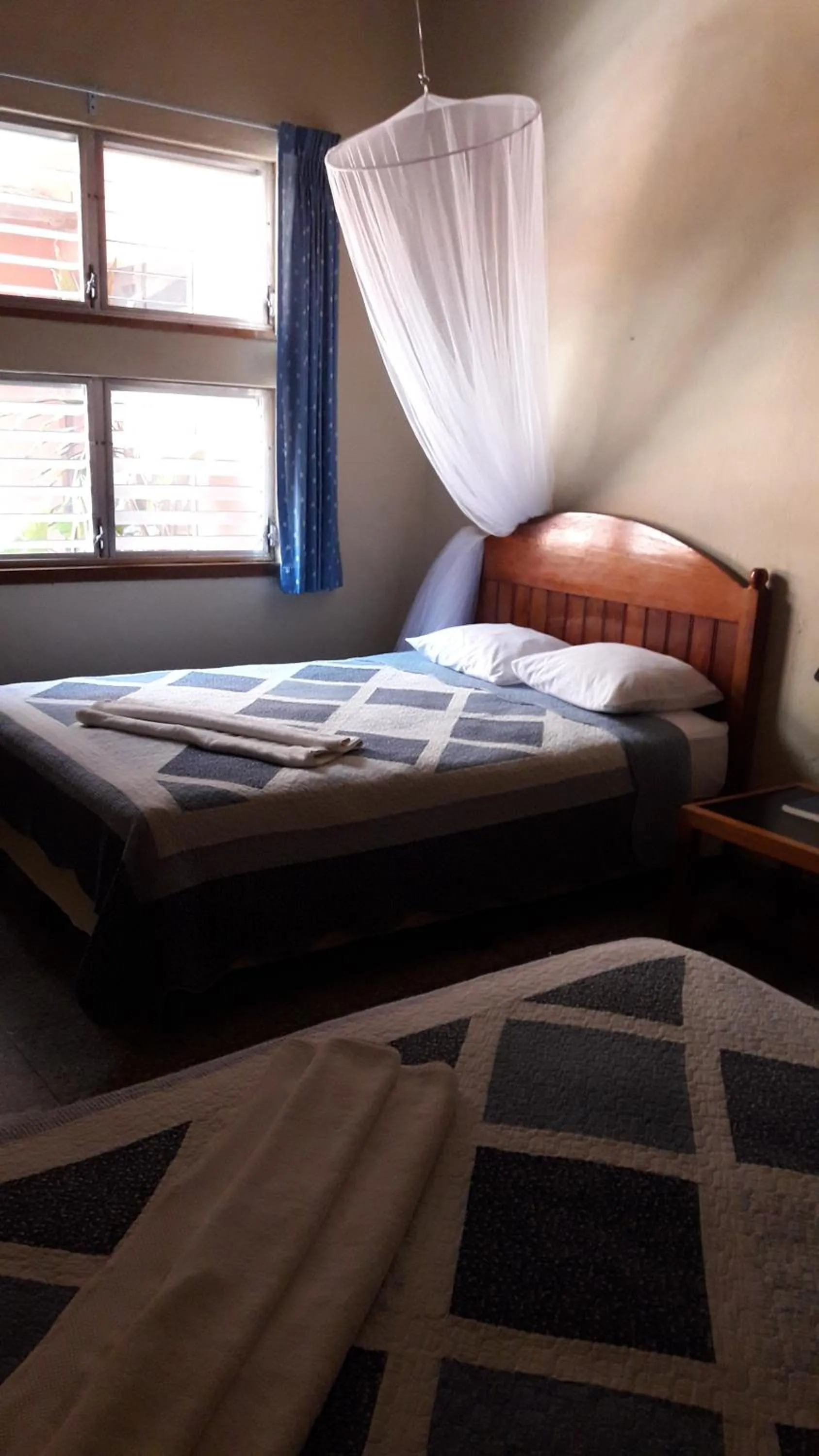 Bed in Hotel Tikal Inn