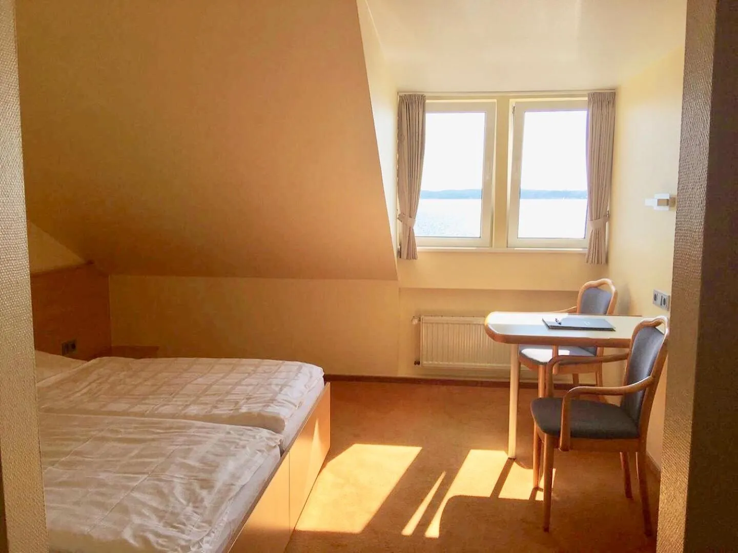 Photo of the whole room, Bed in Hotel Kieler Förde