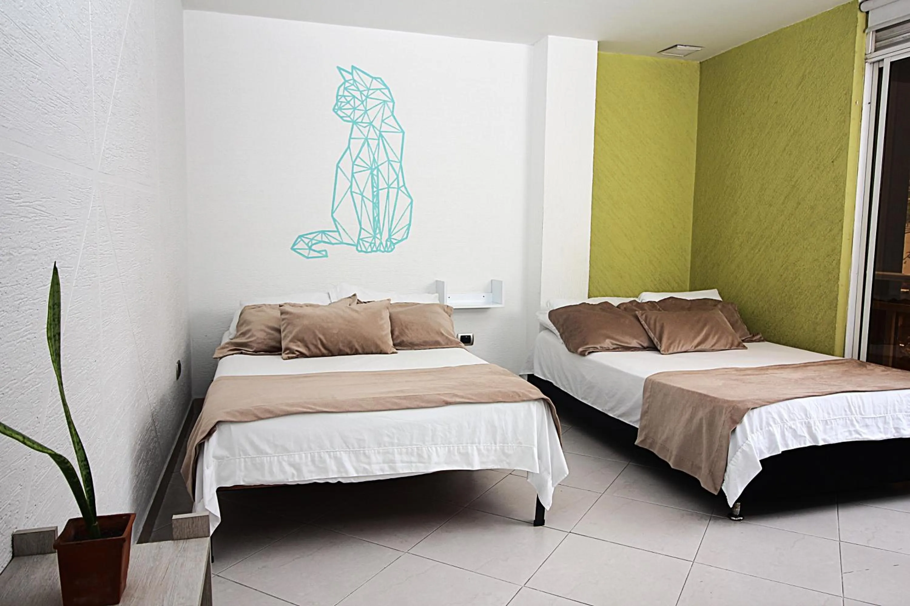 Bed in DAM Hotel Pereira