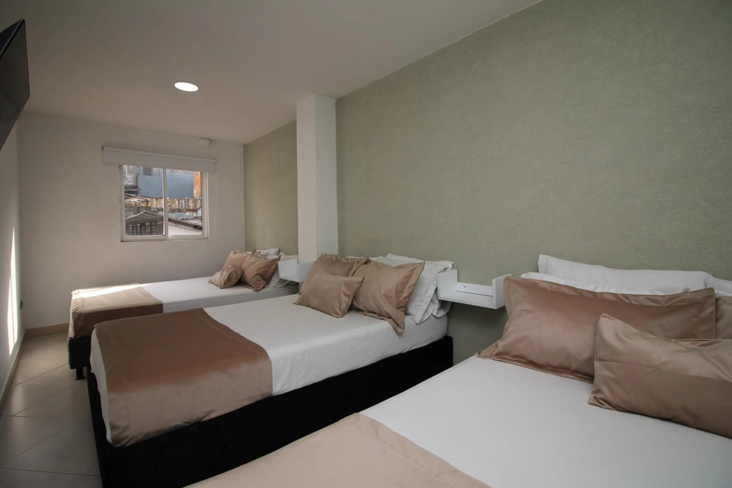 Bed in DAM Hotel Pereira