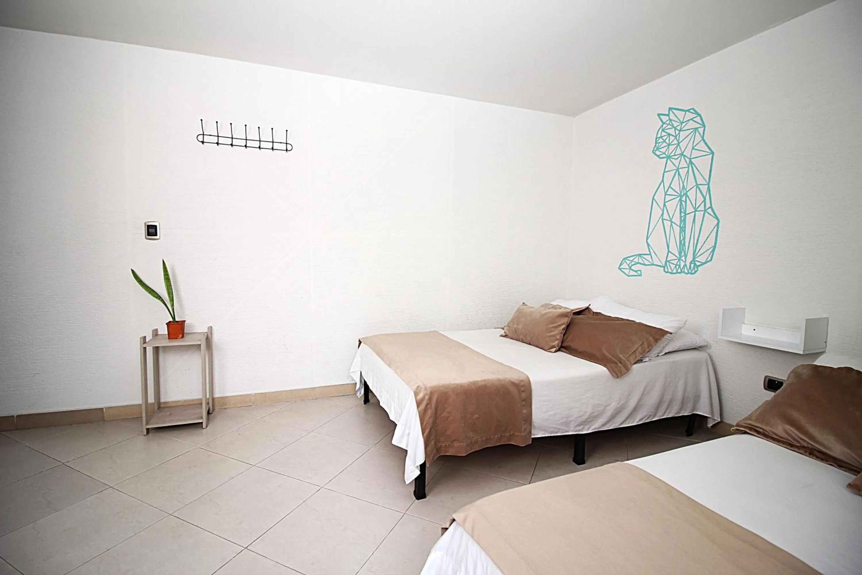 Bed in DAM Hotel Pereira