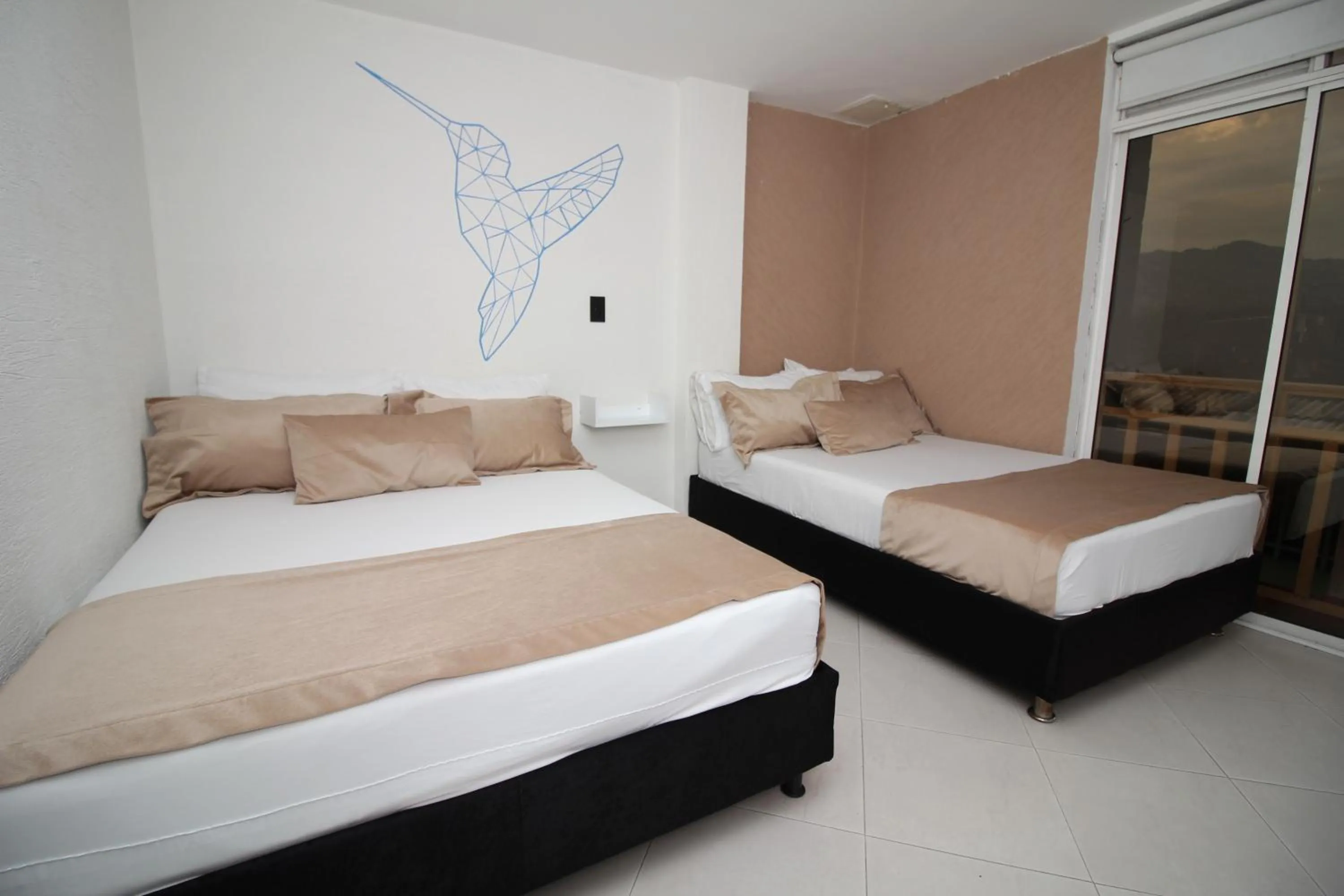 Bed in DAM Hotel Pereira