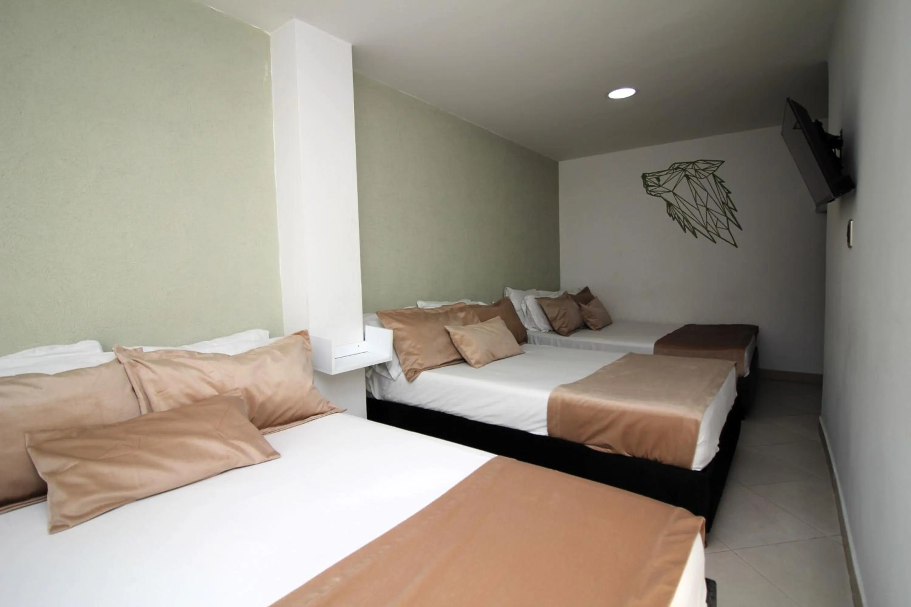 Bed in DAM Hotel Pereira