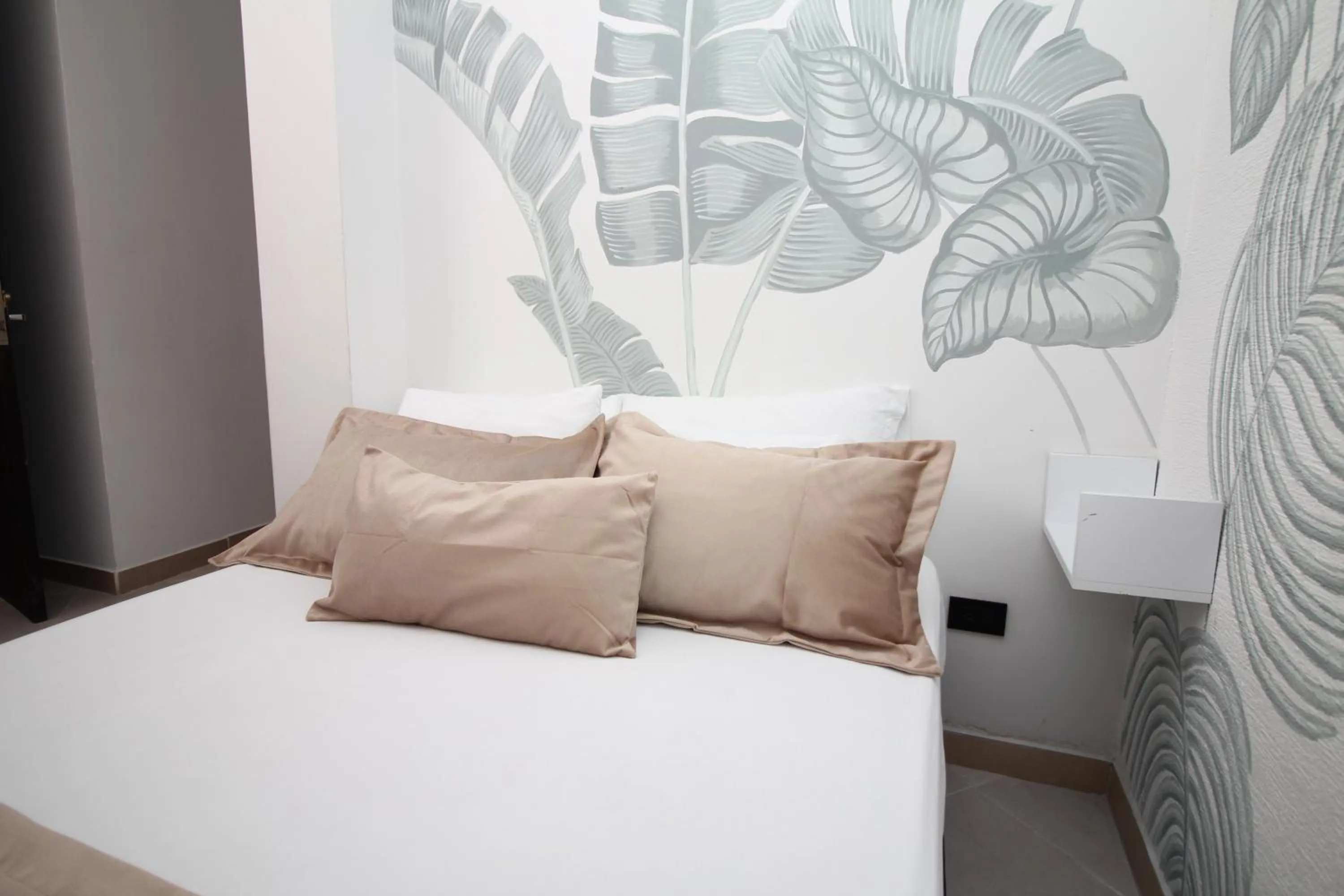 Bed in DAM Hotel Pereira