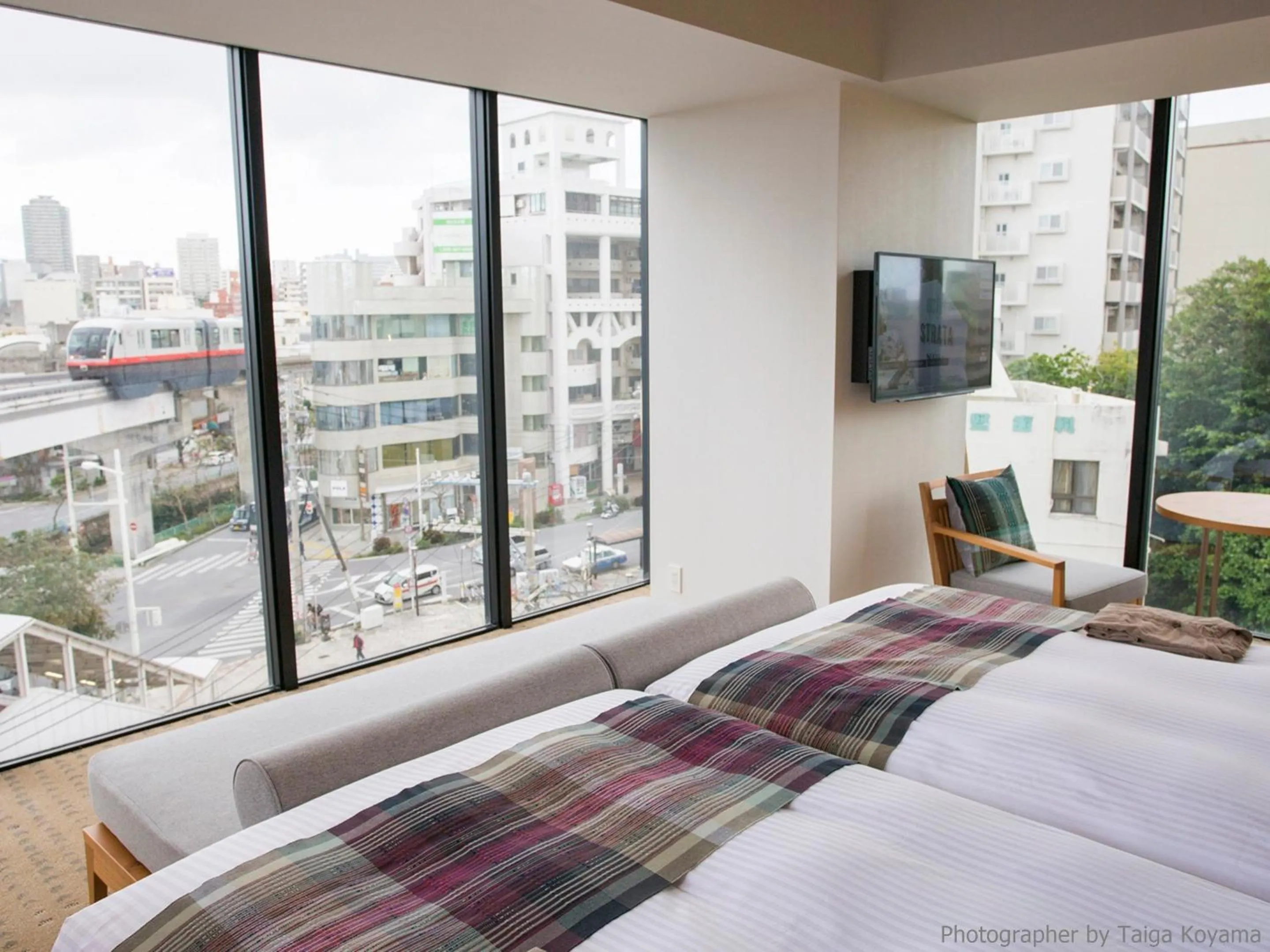 Text overlay, Bed in HOTEL STRATA NAHA