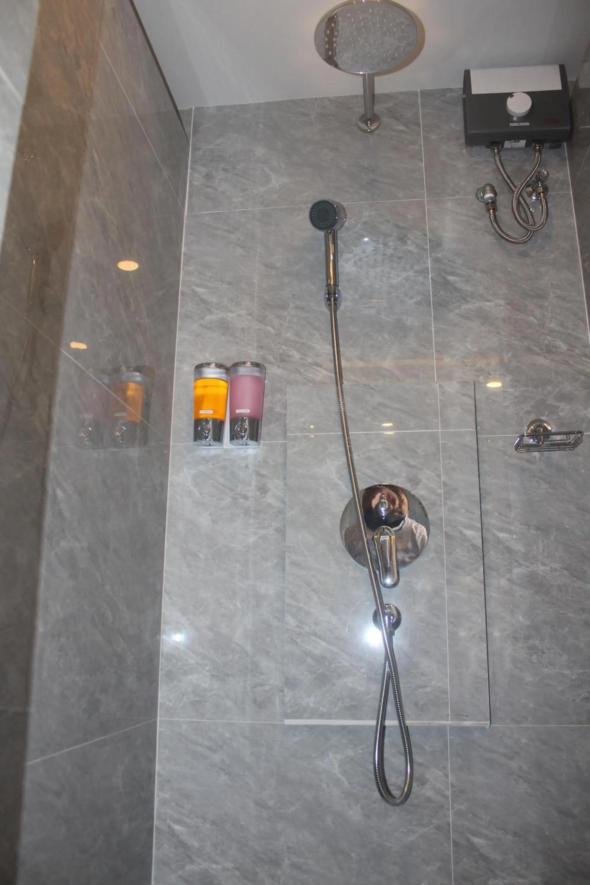 Shower in H-District Boutique Poshotel