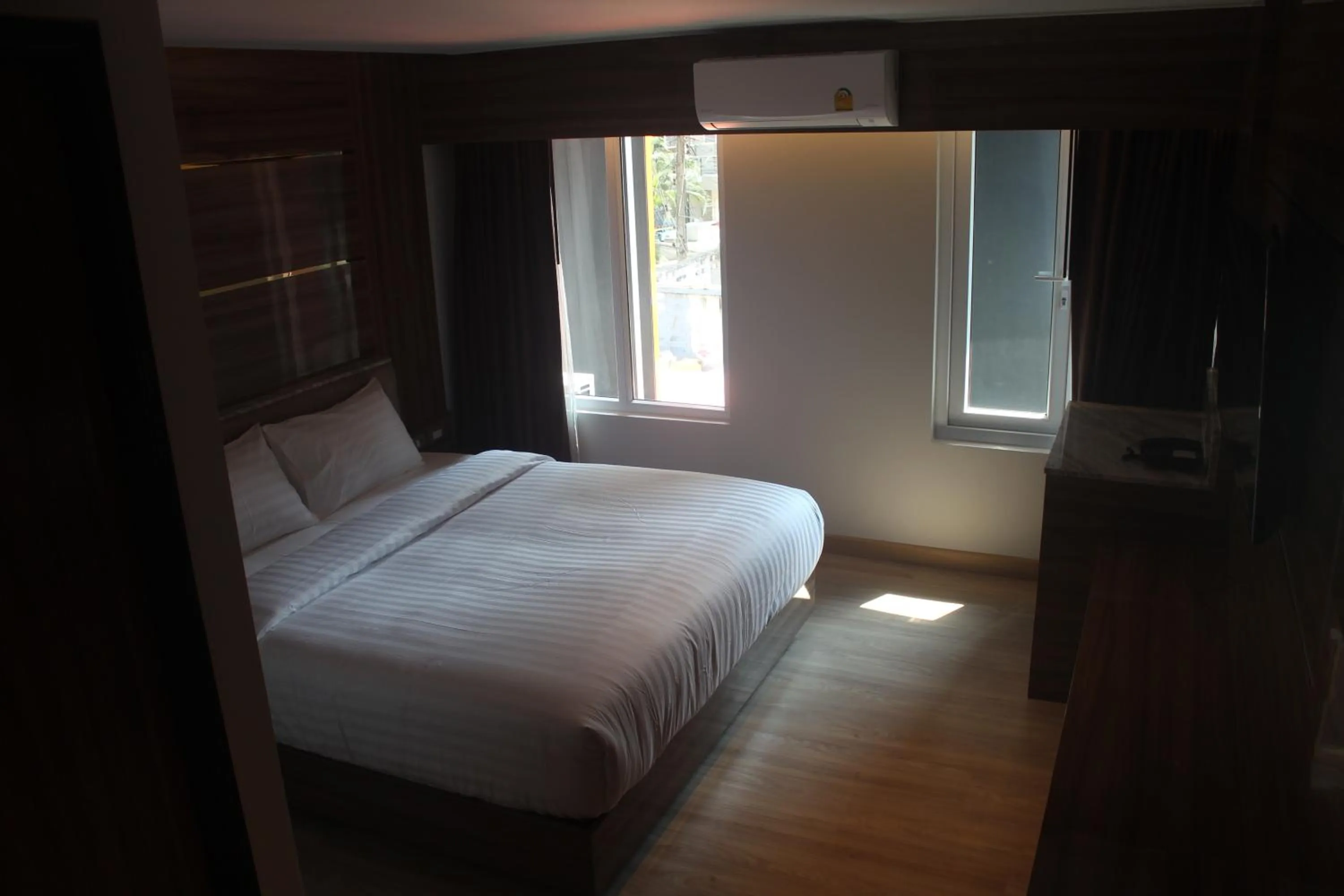 Bed in H-District Boutique Poshotel