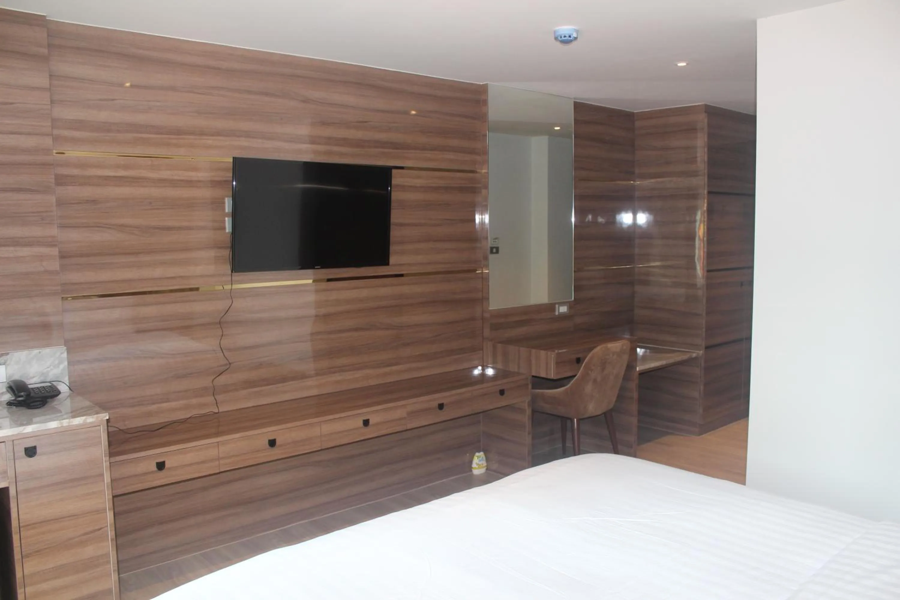 Bed in H-District Boutique Poshotel