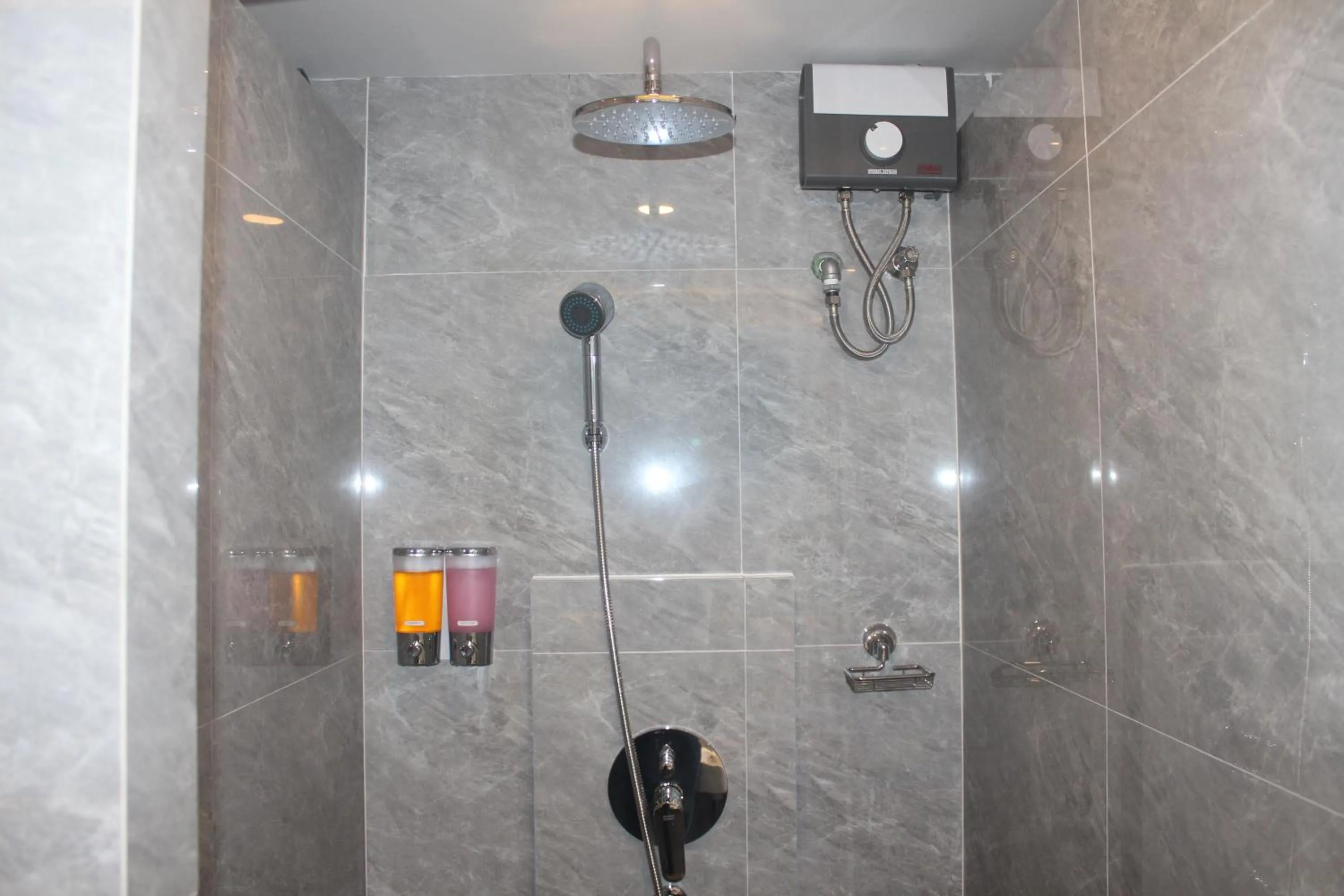 Shower in H-District Boutique Poshotel