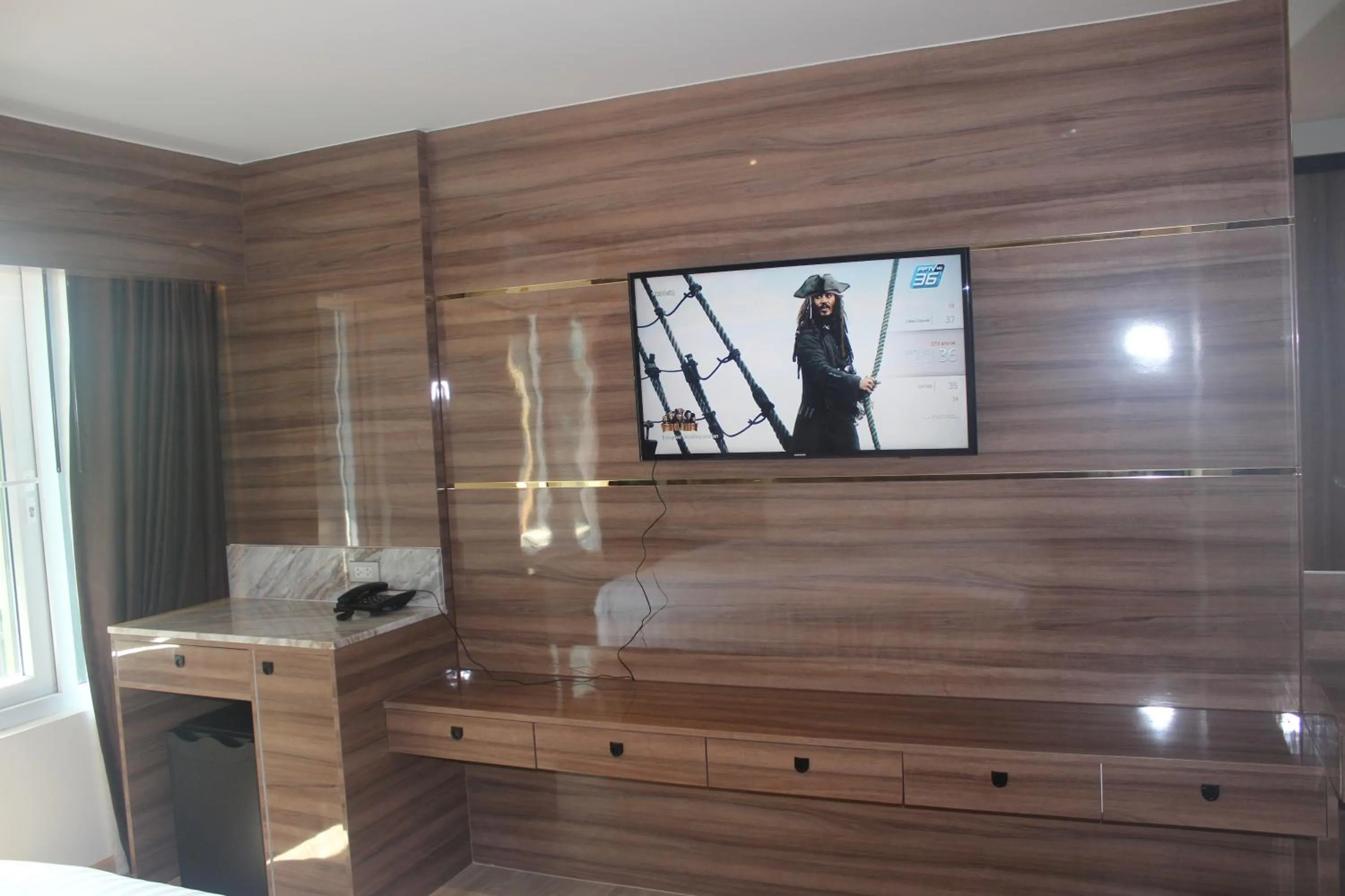 TV and multimedia in H-District Boutique Poshotel